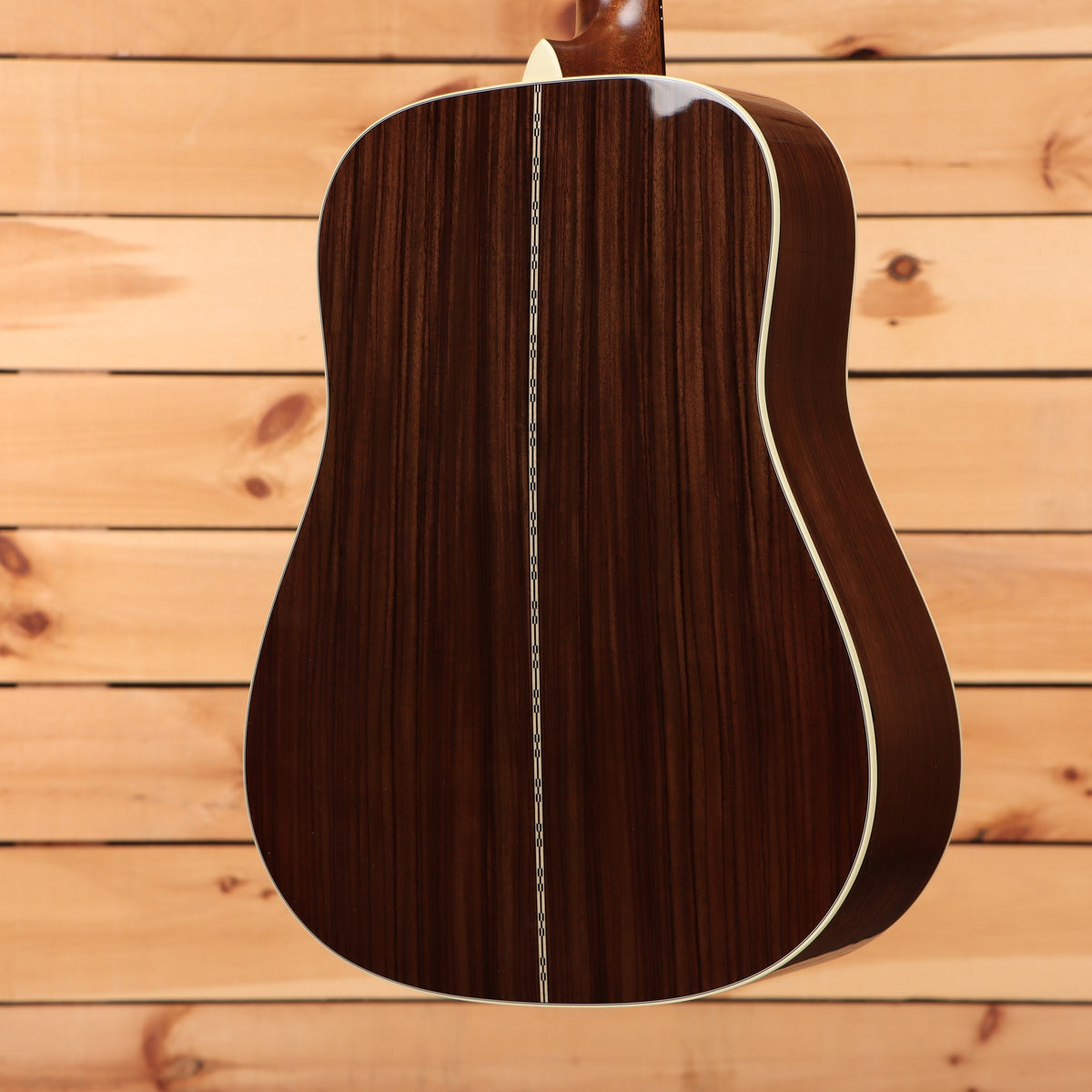 Martin D-28 dreadnought acoustic guitar Natural with Aging Toner showing rosewood back with decorative center seam inlay
