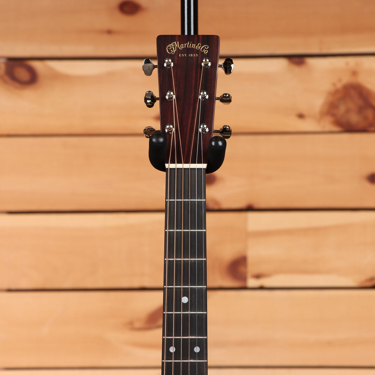 Martin D-28 acoustic dreadnought guitar Natural with Aging Toner featuring ebony fretboard and chrome tuners