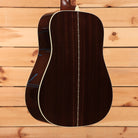 Martin D-28 dreadnought acoustic guitar Natural with Aging Toner showing rosewood back with diamond inlay center strip and wh