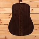 Martin D-28 dreadnought acoustic guitar natural with aging toner showing rosewood back with decorative center seam inlay