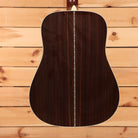 Martin D-28 dreadnought acoustic guitar natural with aging toner showing rosewood back with decorative center seam inlay