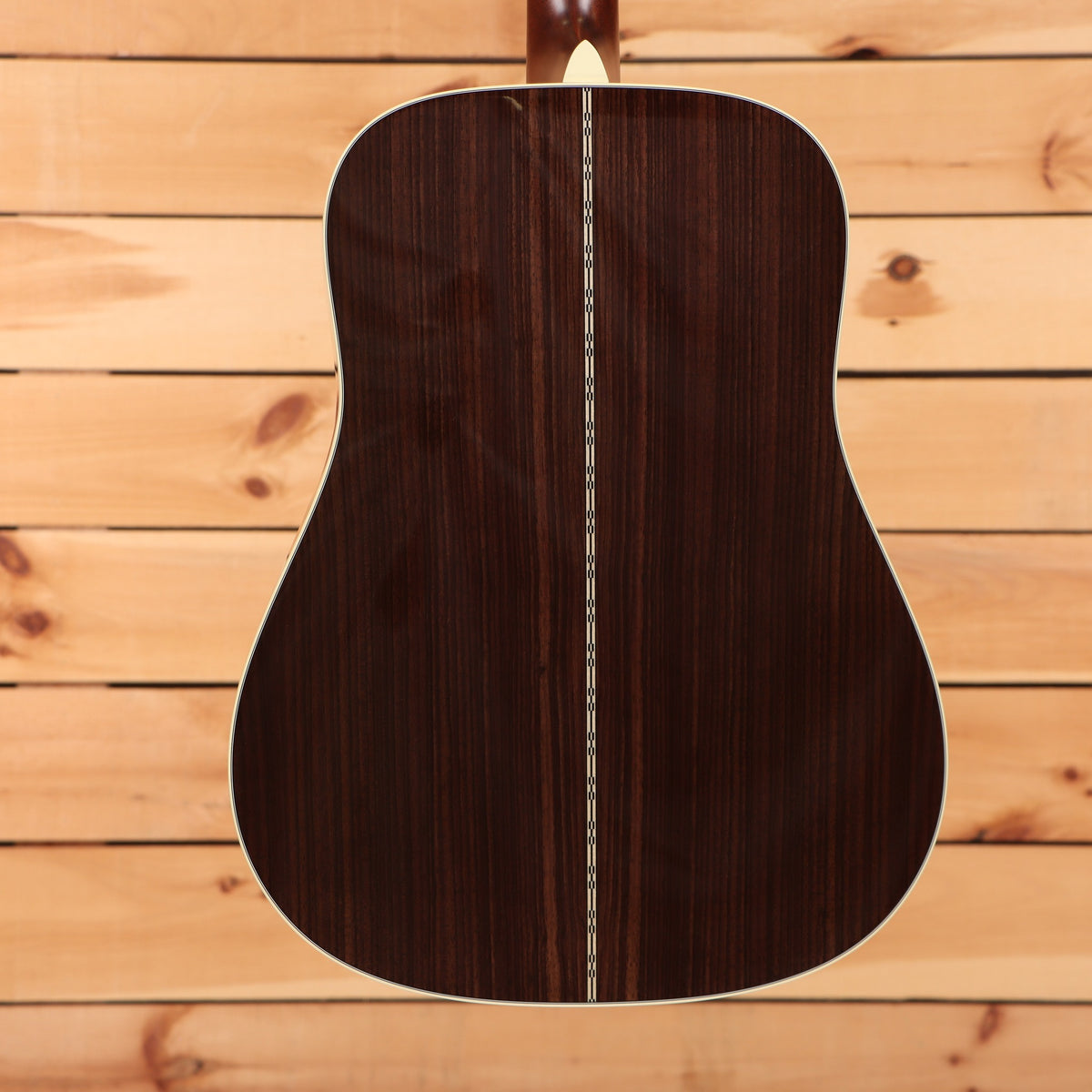 Martin D-28 dreadnought acoustic guitar natural with aging toner showing rosewood back with decorative center seam inlay