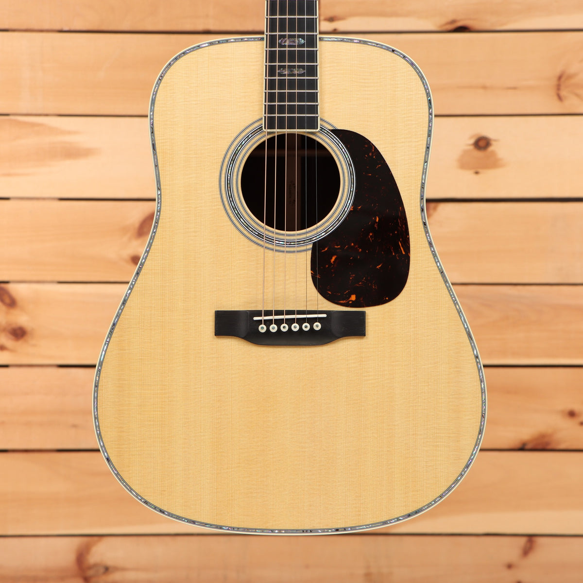 Martin D-41 dreadnought acoustic guitar Natural with Aging Toner spruce top tortoise pickguard and herringbone binding