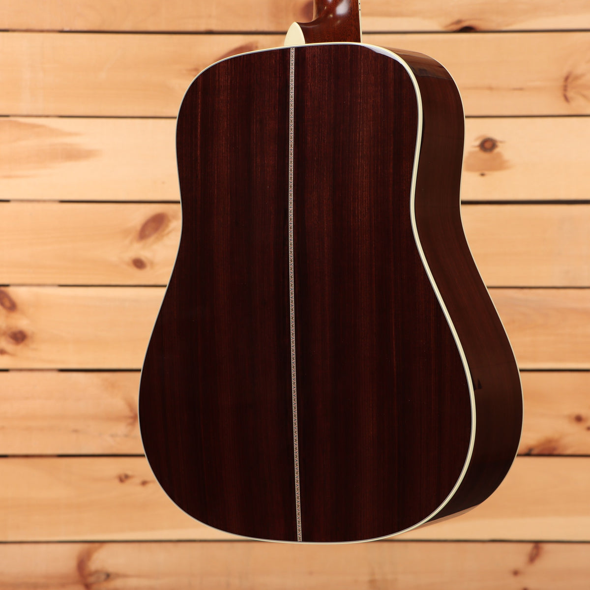 Martin D-41 dreadnought acoustic guitar Natural with Aging Toner featuring rosewood back with herringbone center strip