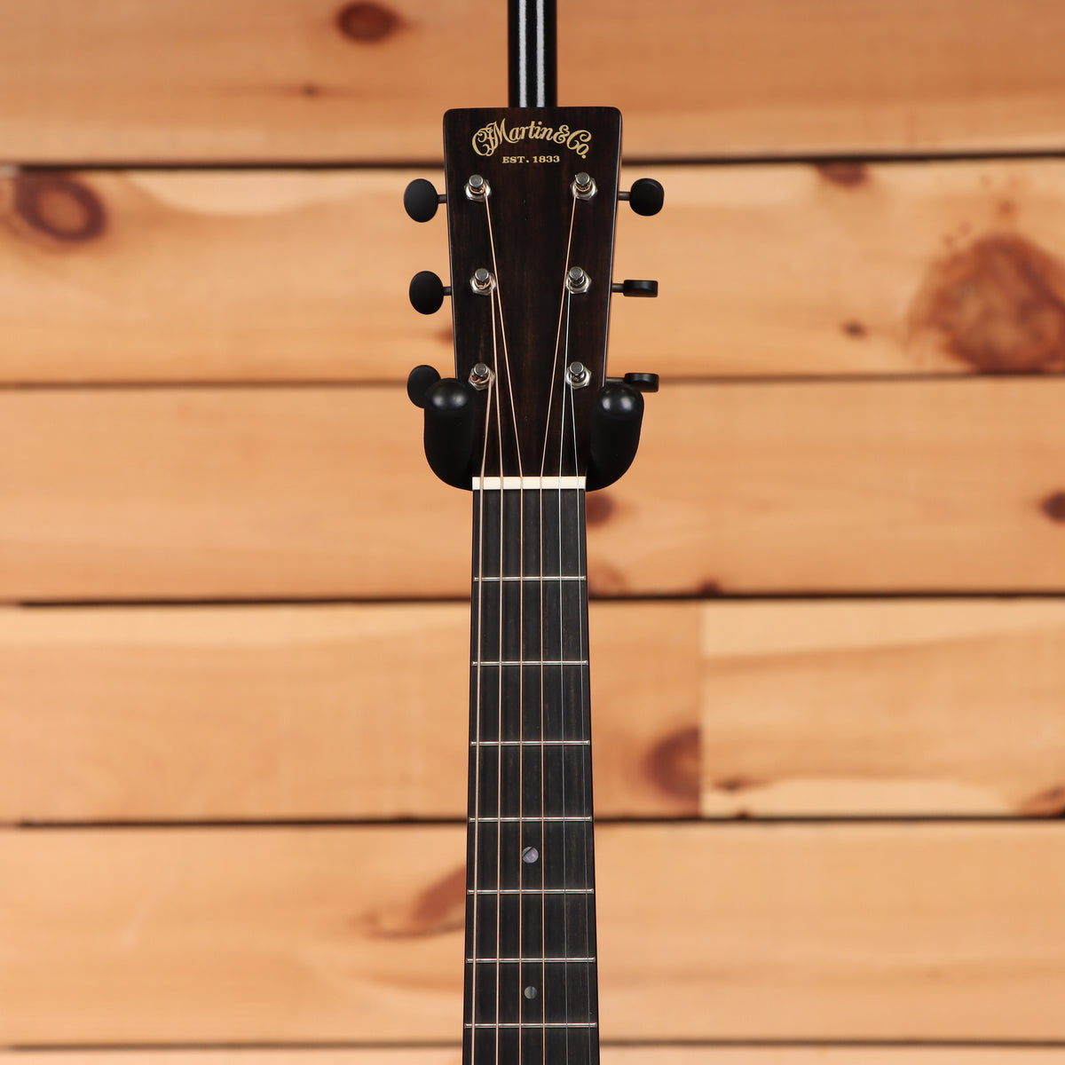 Martin CEO-7 Autumn Sunset acoustic guitar headstock with dark fretboard and black tuning machines