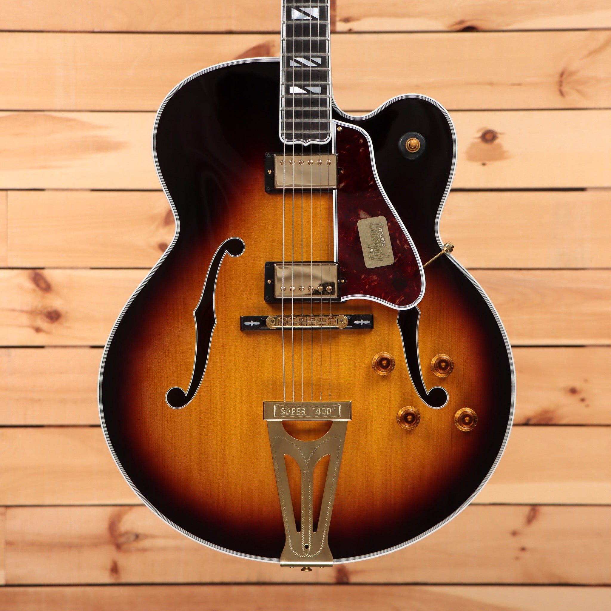 Gibson Super 400 semi-hollow electric guitar tobacco sunburst with dual f-holes and gold hardware