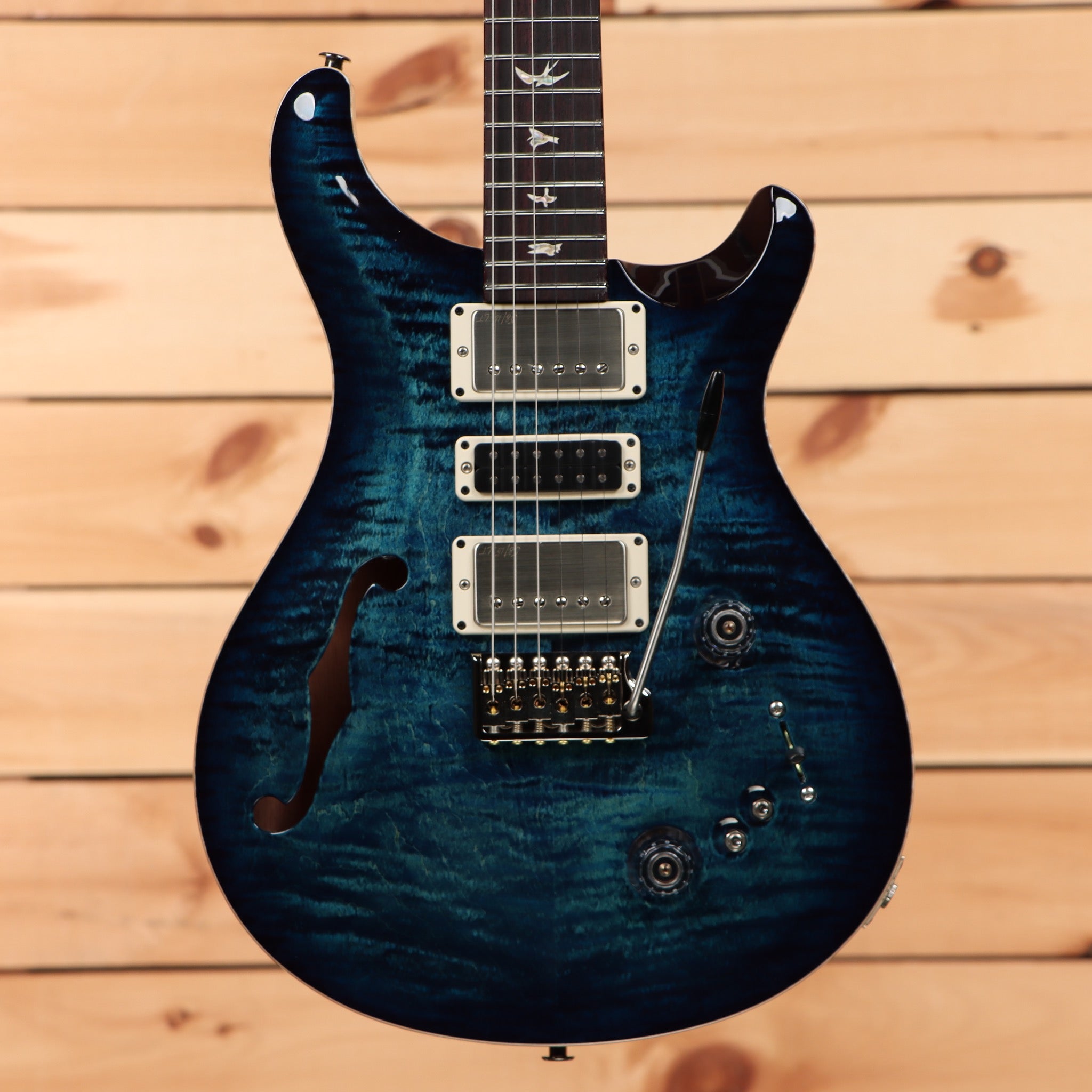Paul Reed Smith Special Semi-Hollow Cobalt Blue electric guitar with white pickguard and gold hardware