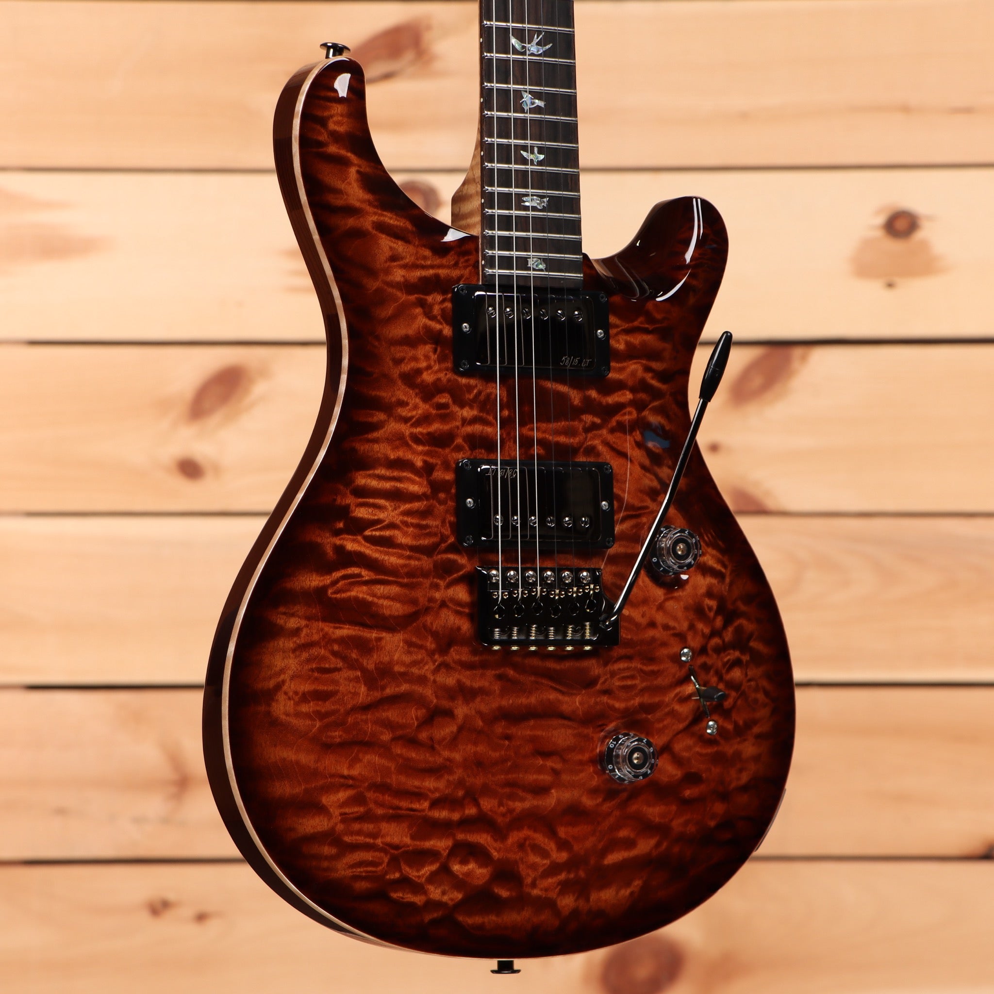 Paul Reed Smith Custom 24 Wood Library electric guitar Copperhead Burst with flamed maple top and dual humbuckers