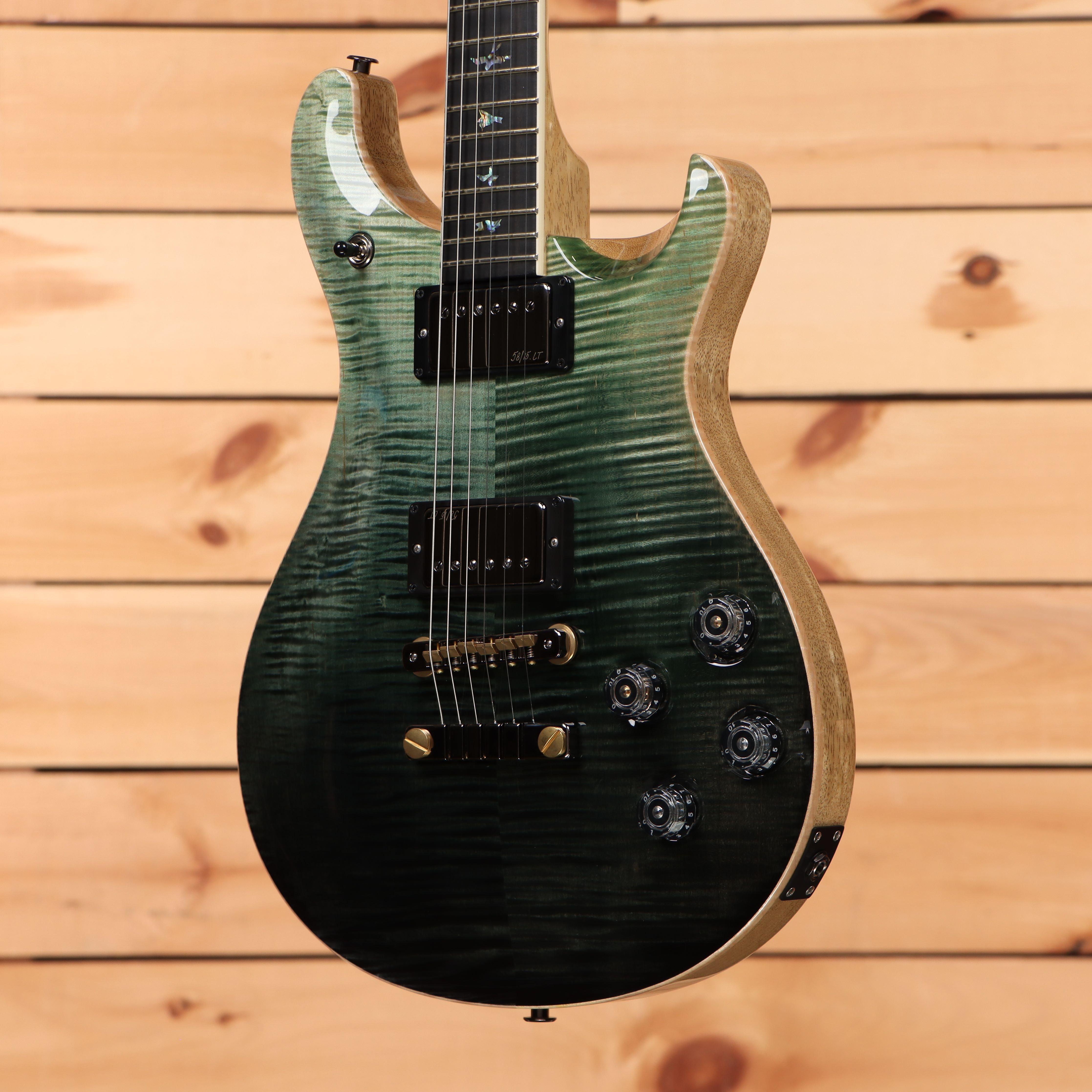 Paul Reed Smith McCarty 594 Wood Library electric guitar Trampas Green Fade with flamed maple top and humbucker pickups