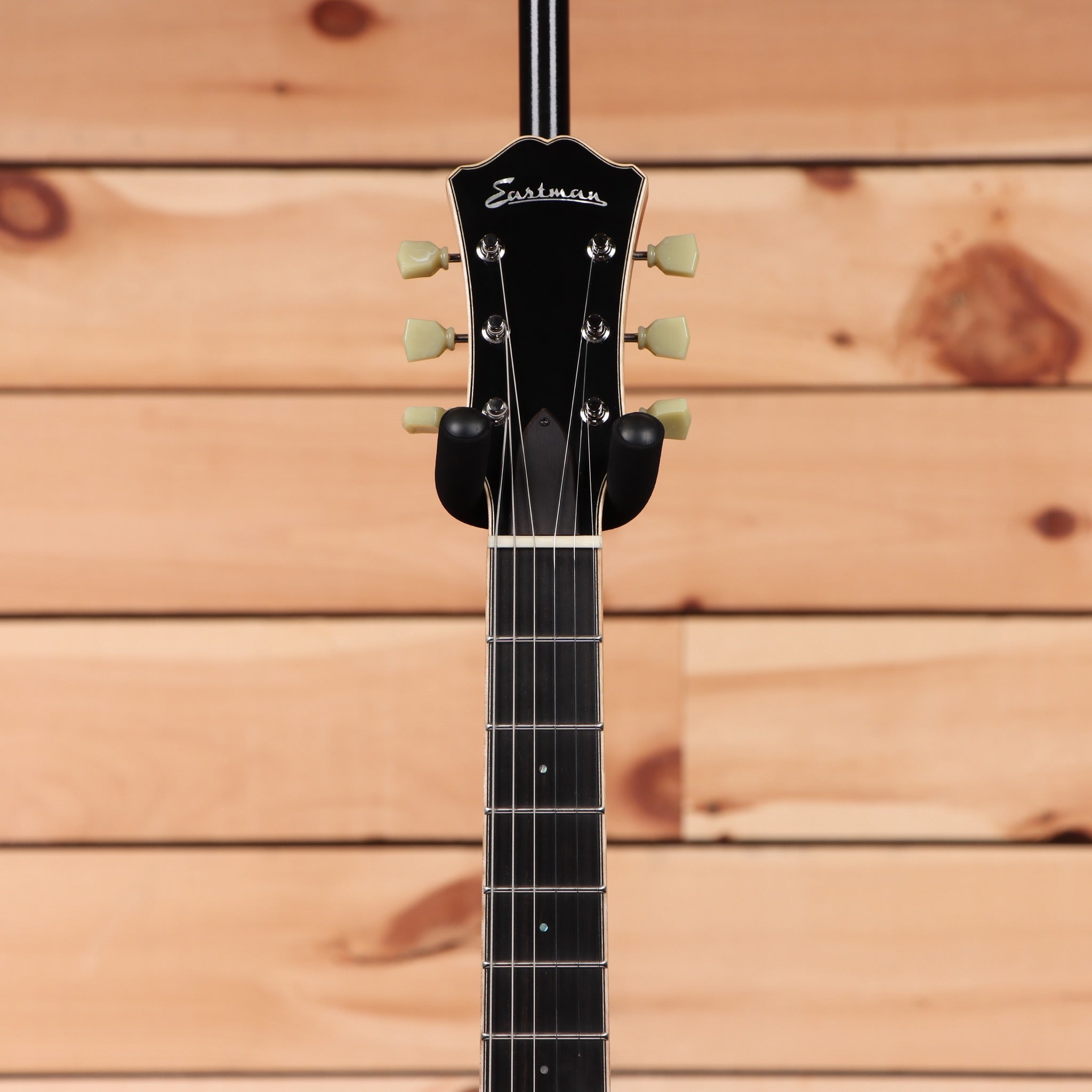 Eastman T184mx semi-hollow electric guitar Goldburst with cream tuning pegs and dual humbuckers