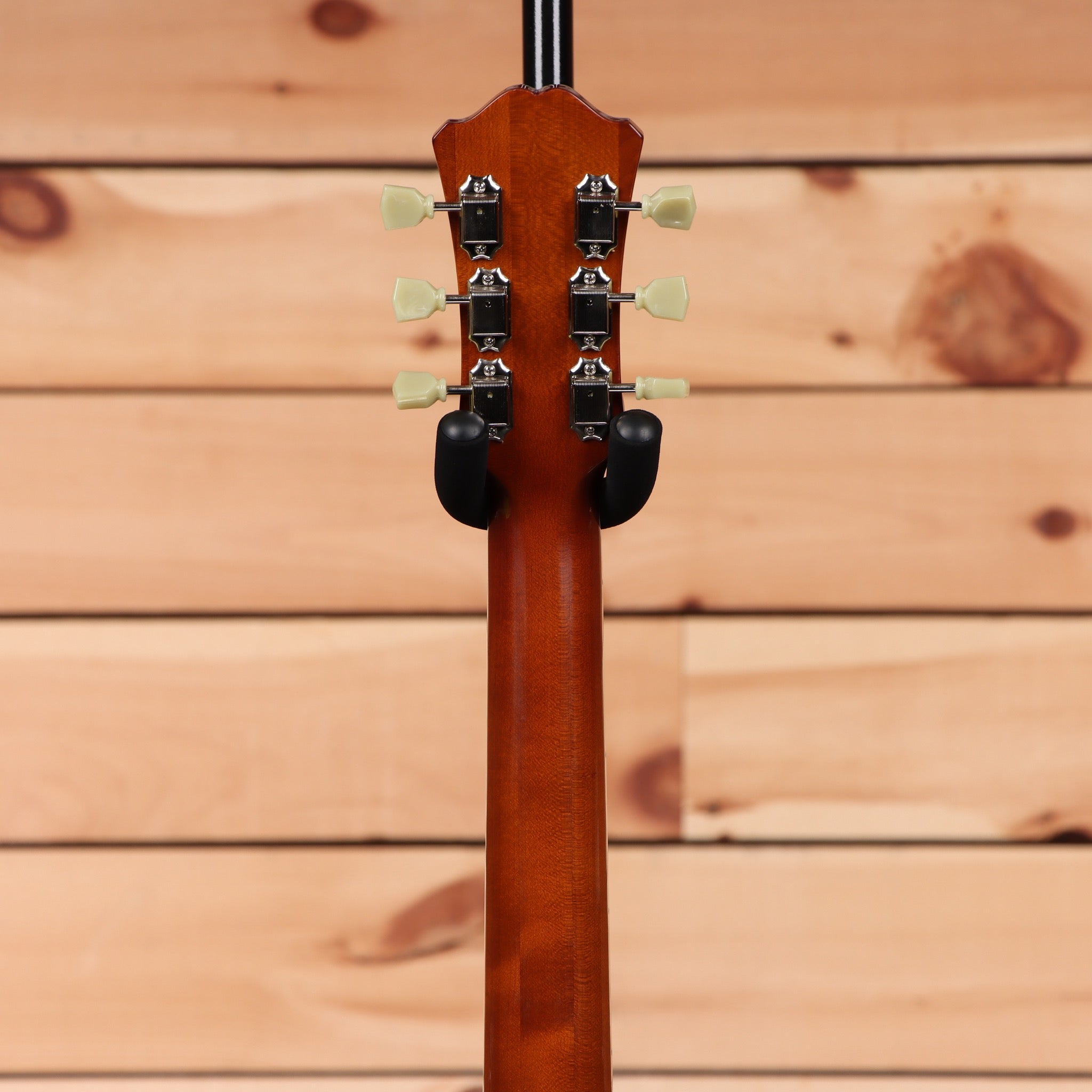 Eastman T184MX semi-hollow body electric guitar Goldburst with cream tuning pegs and black pickguard