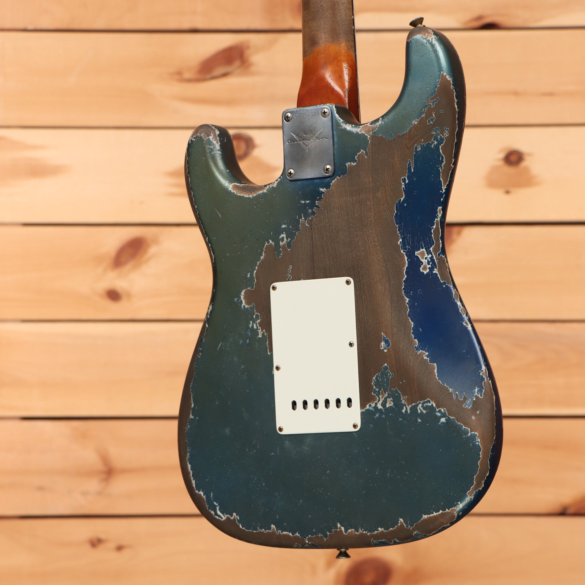 Fender Custom Shop Masterbuilt Dale Wilson 1961 Stratocaster heavy relic Dark Lake Placid Blue electric guitar with white pickguard