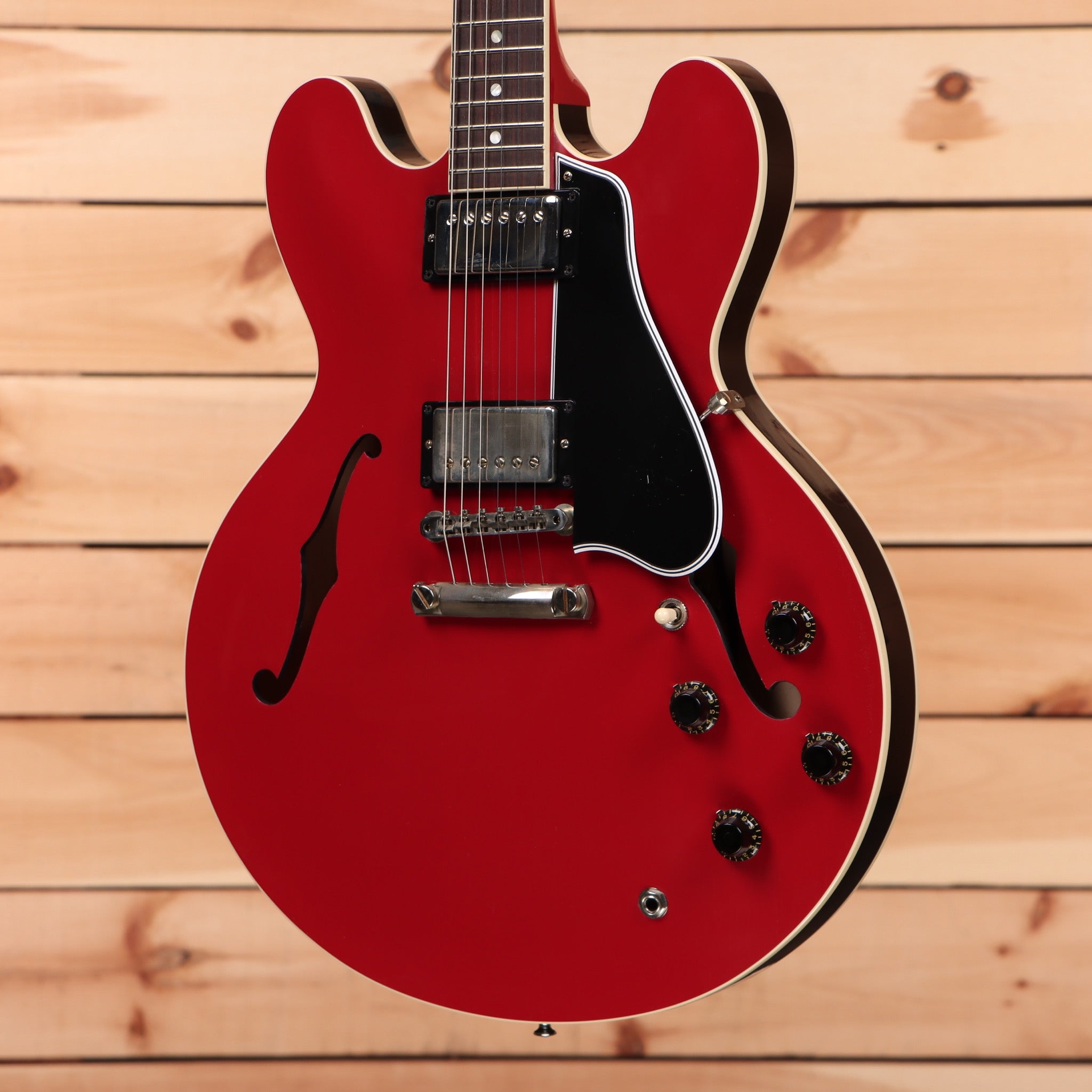 Gibson ES-335 semi-hollow electric guitar Cardinal Red with f-holes and dual humbuckers
