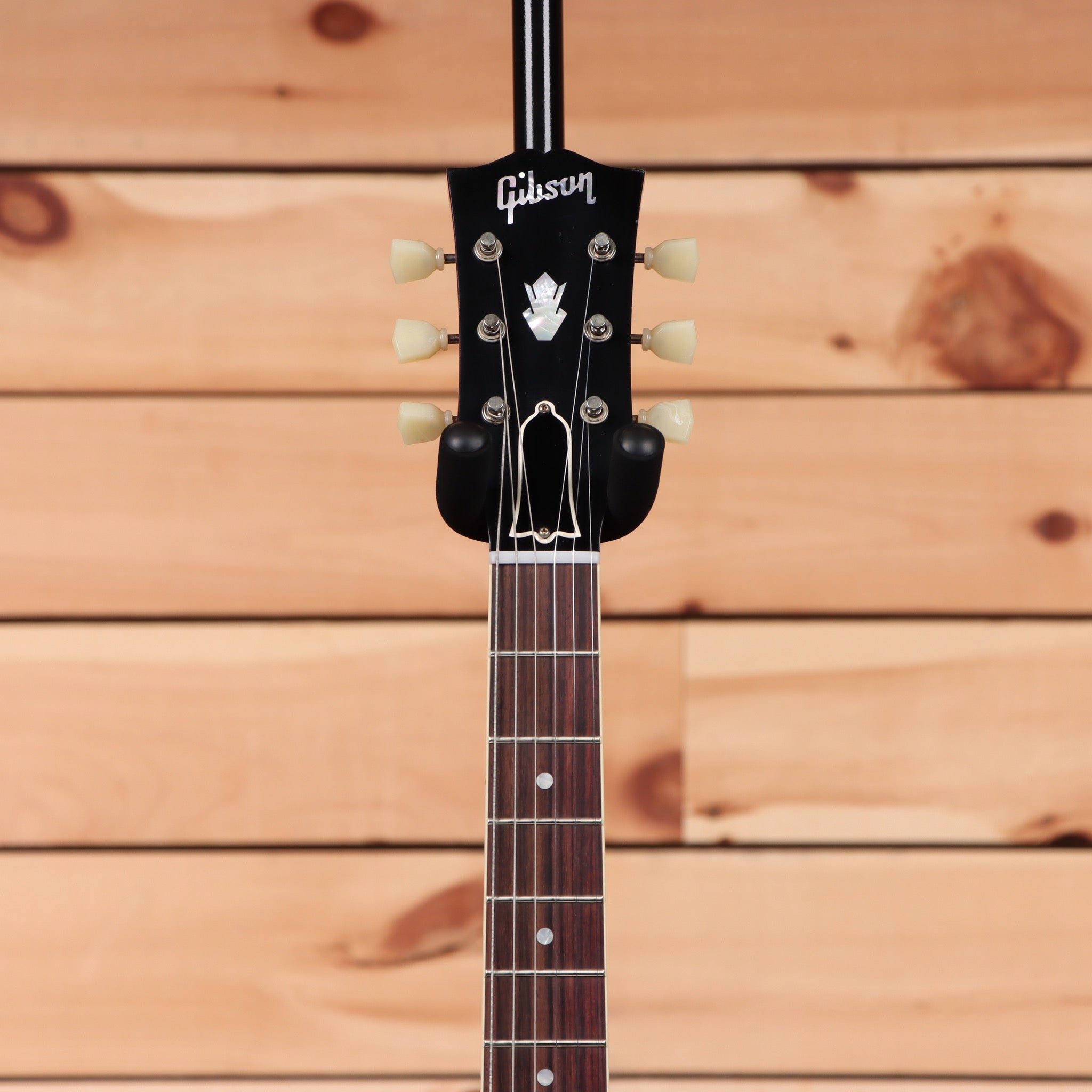 Gibson ES-335 semi-hollow electric guitar Cardinal Red/Black with cream tuning pegs and rosewood fretboard