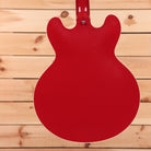 Gibson ES-335 semi-hollow electric guitar Cardinal Red with f-holes and single-cutaway body