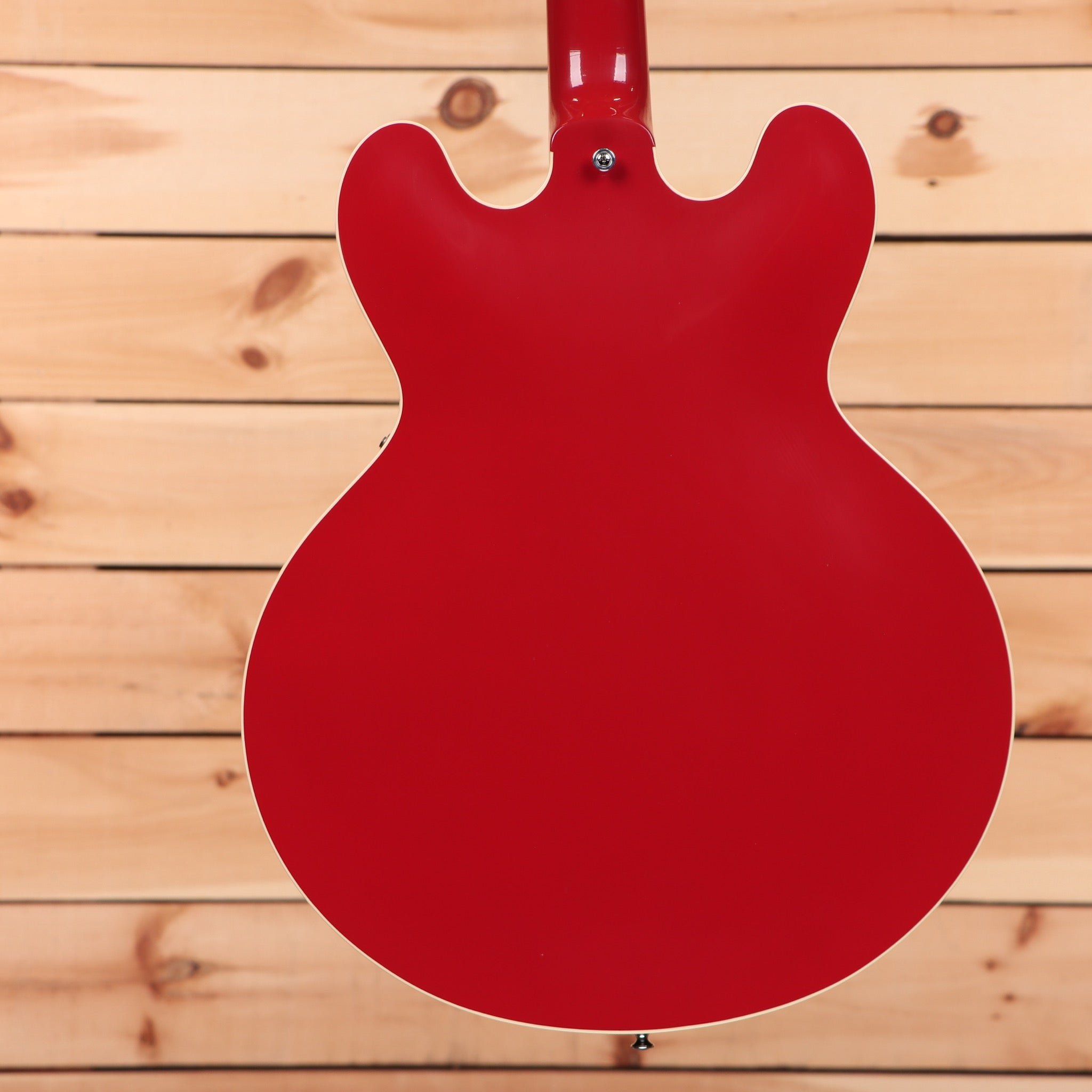 Gibson ES-335 semi-hollow electric guitar Cardinal Red with f-holes and single-cutaway body