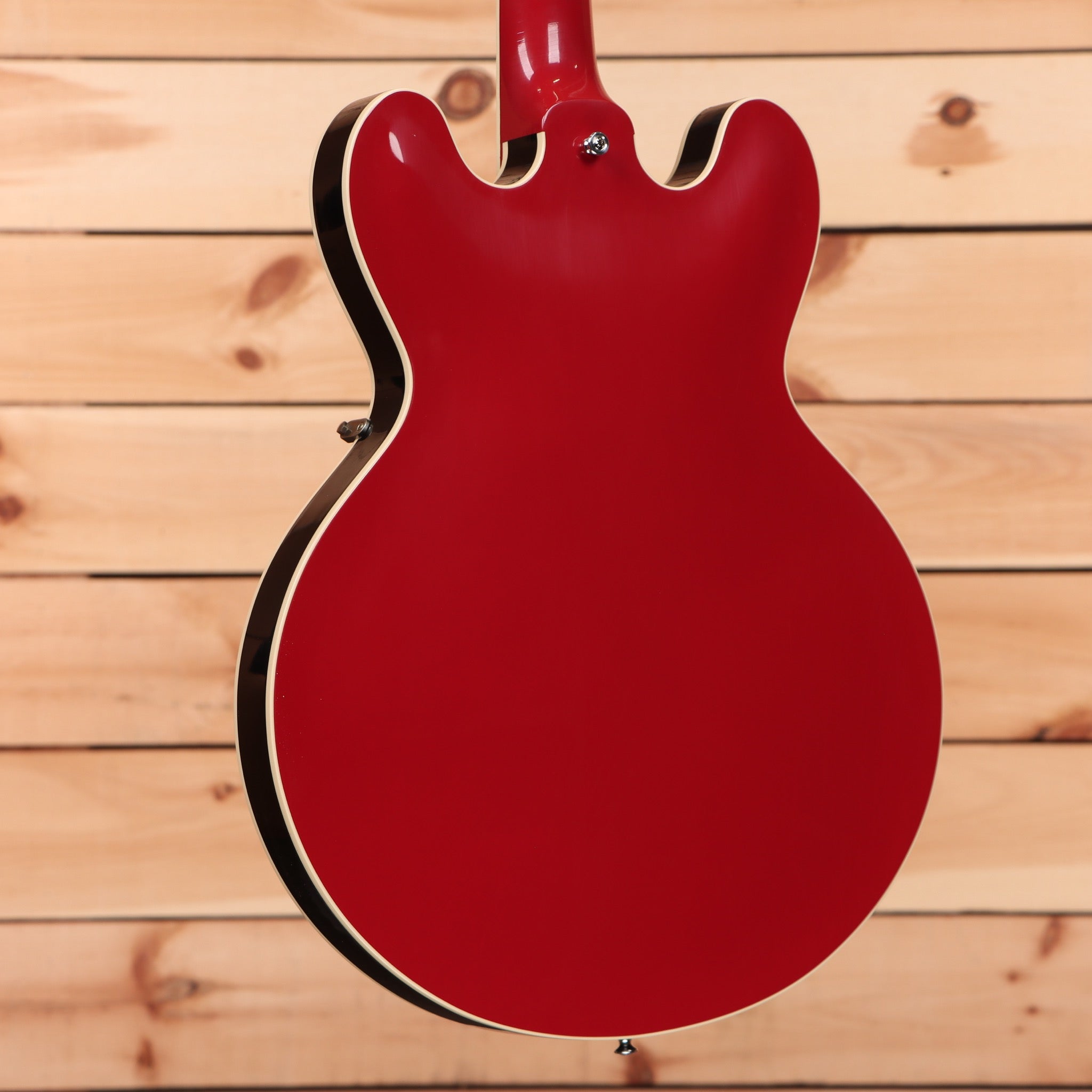 Gibson ES-335 semi-hollow electric guitar Cardinal Red with white binding and dual humbuckers