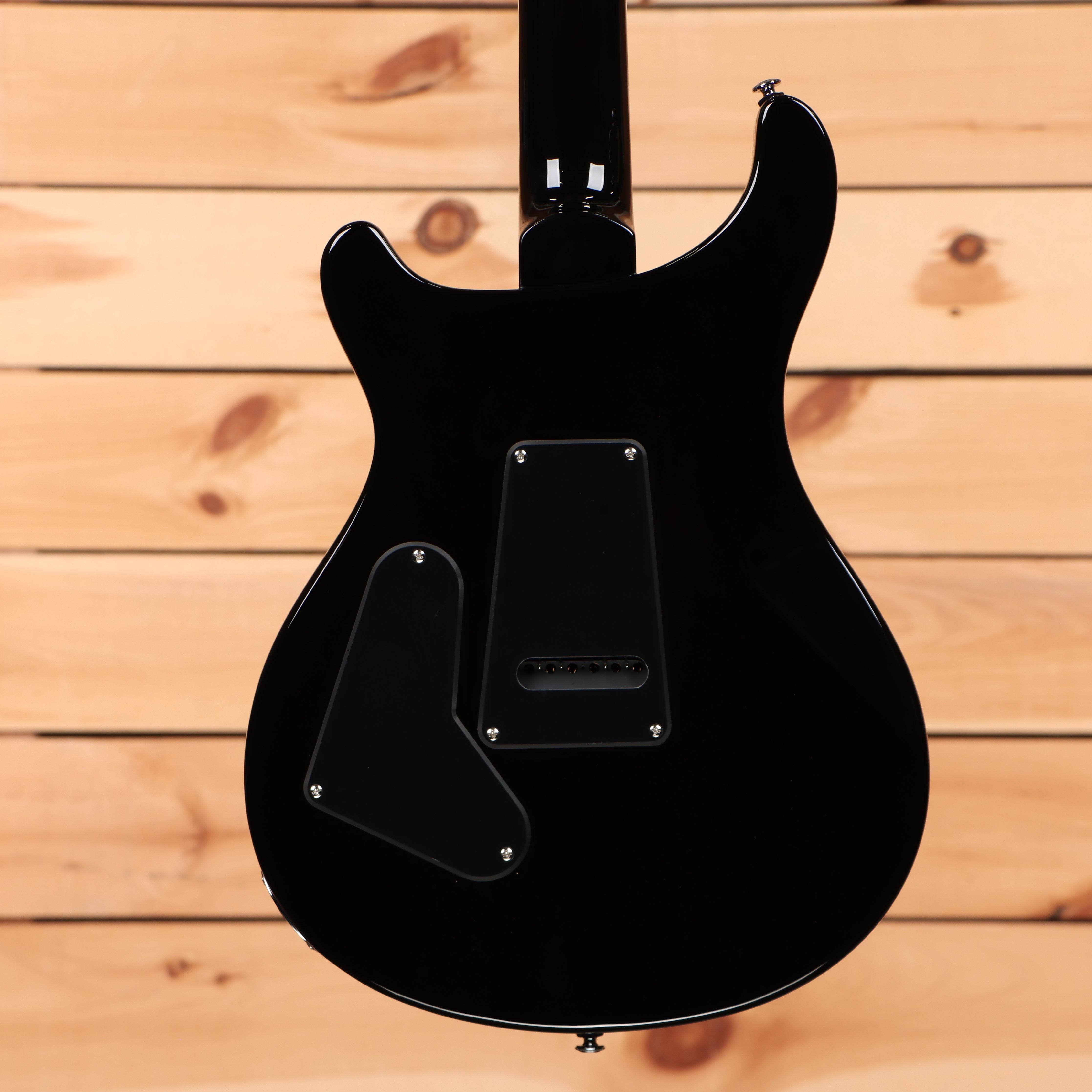 Paul Reed Smith SE Custom 24 black electric guitar with gold hardware and dual humbuckers
