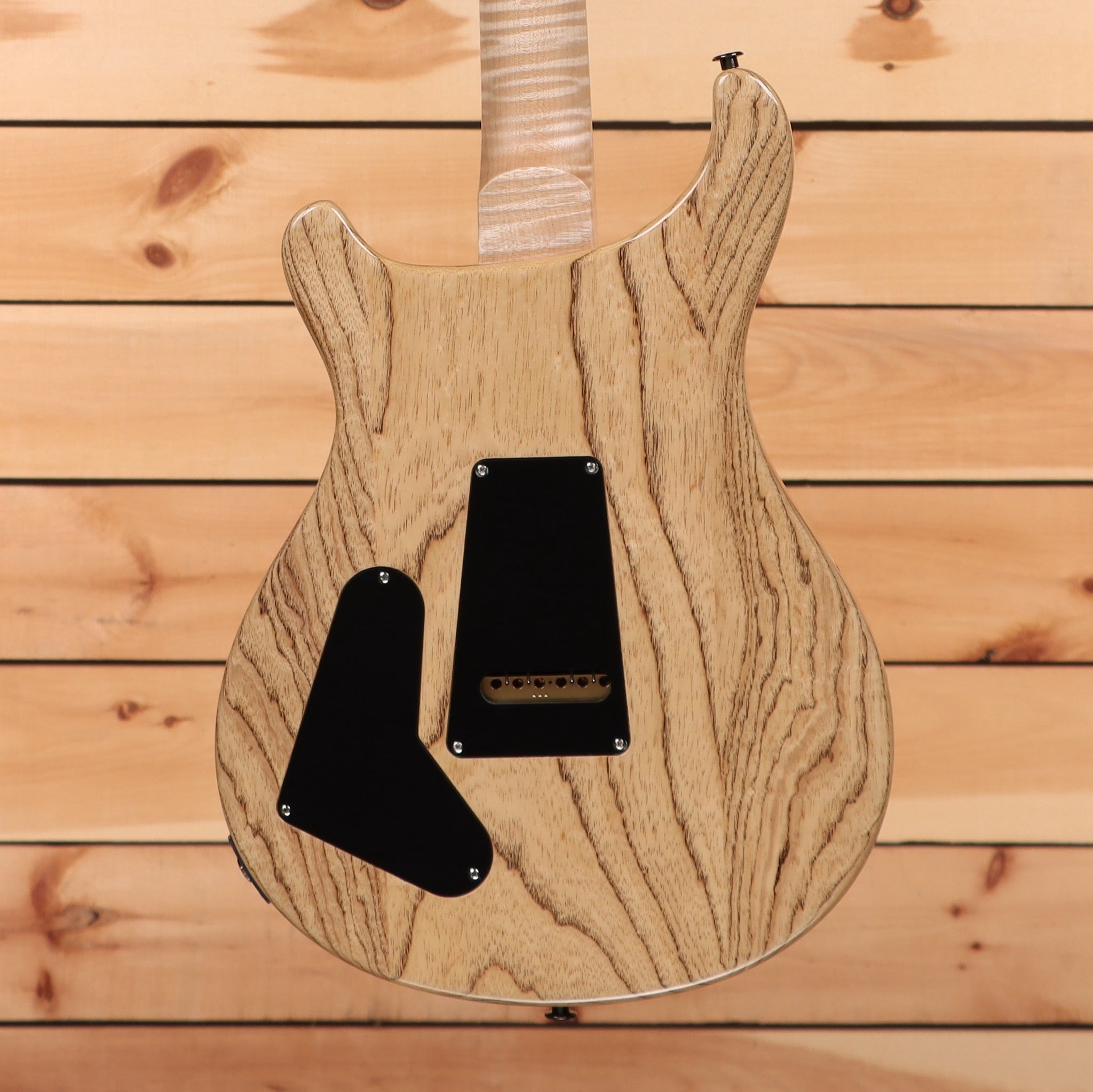 Paul Reed Smith Special semi-hollow electric guitar natural wood grain finish with black pickguard