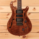 Paul Reed Smith Special semi-hollow electric guitar Copperhead flame with humbucker pickups and f-hole design