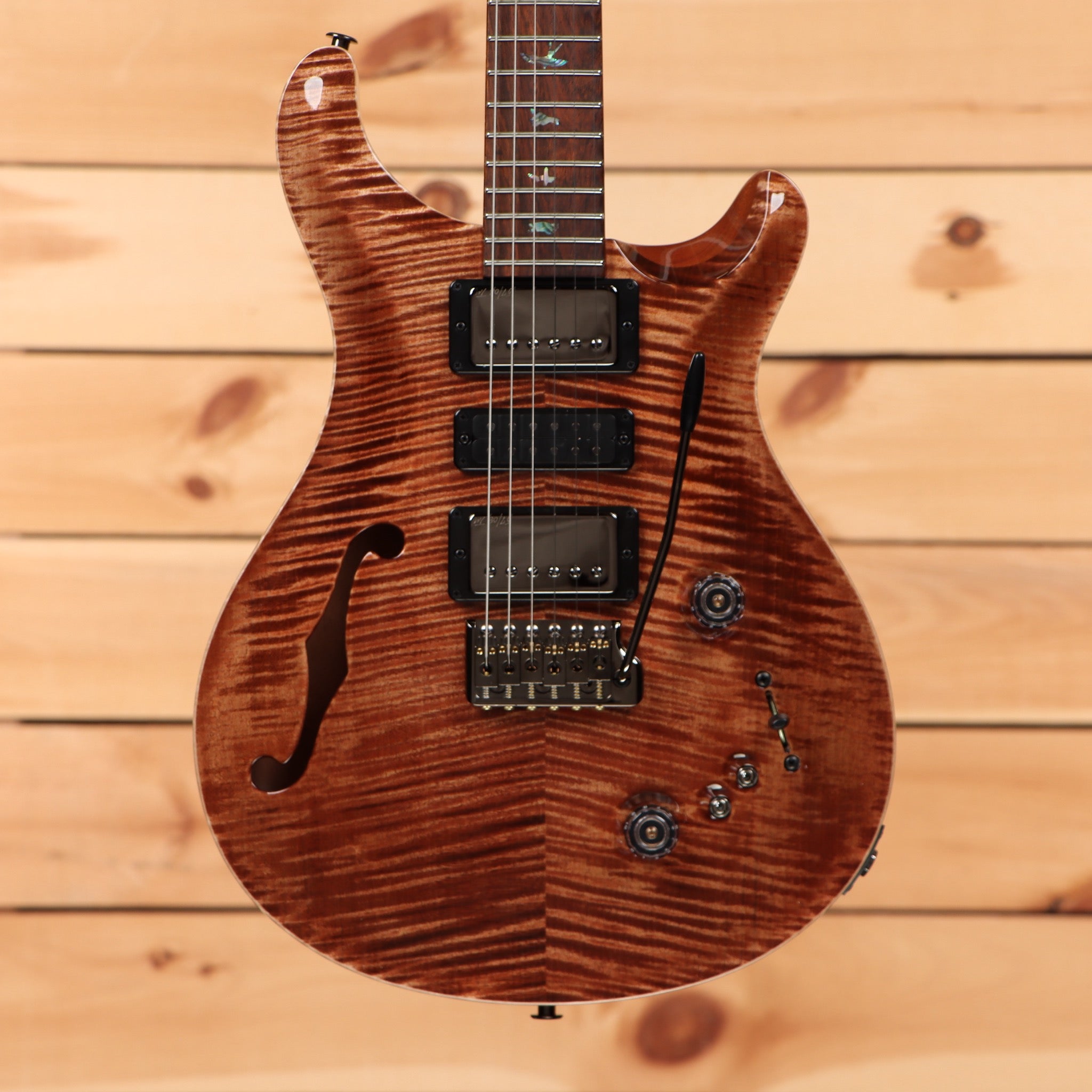 Paul Reed Smith Special semi-hollow electric guitar Copperhead flame with humbucker pickups and f-hole design
