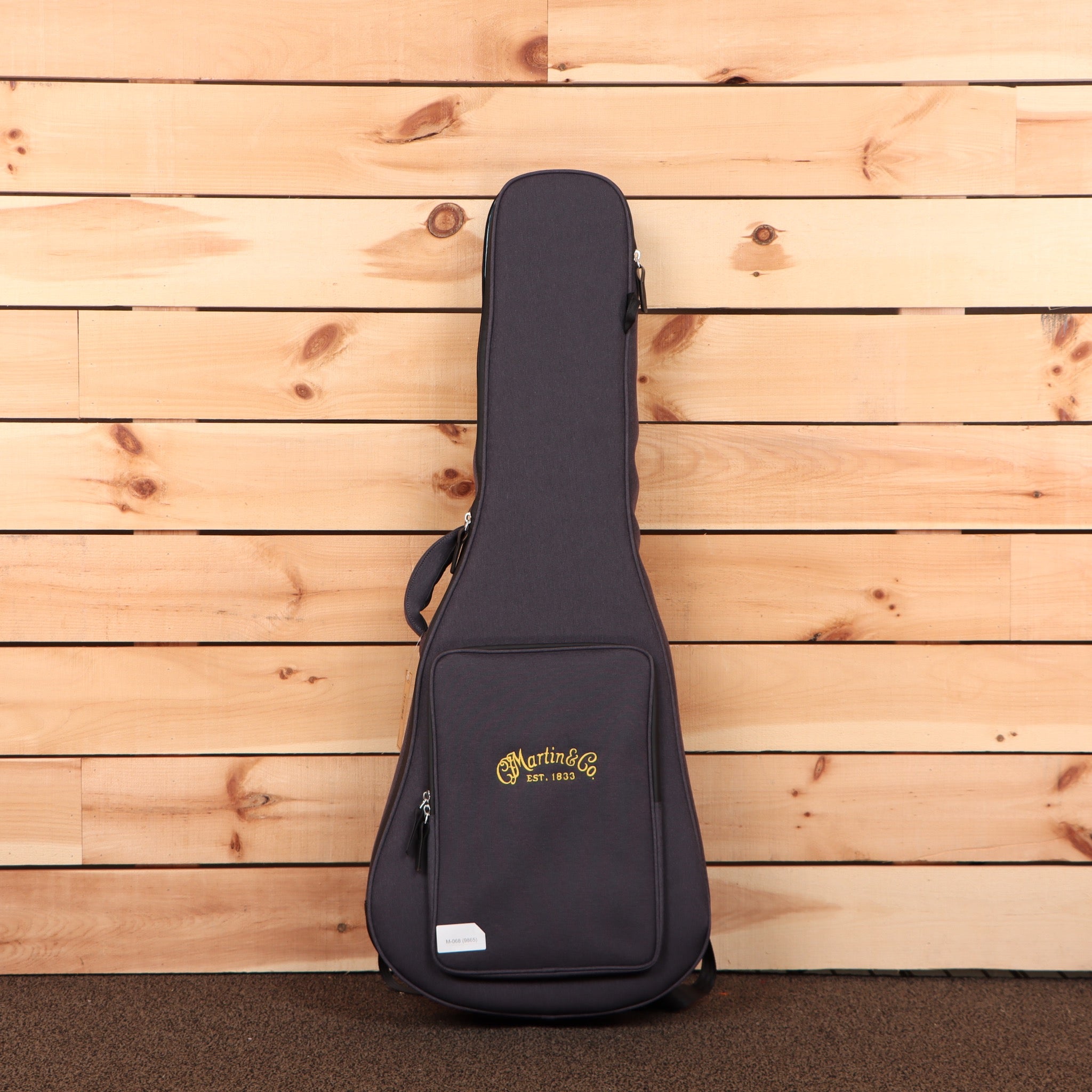 Martin 00-15M natural acoustic guitar gig bag with gold logo embroidery