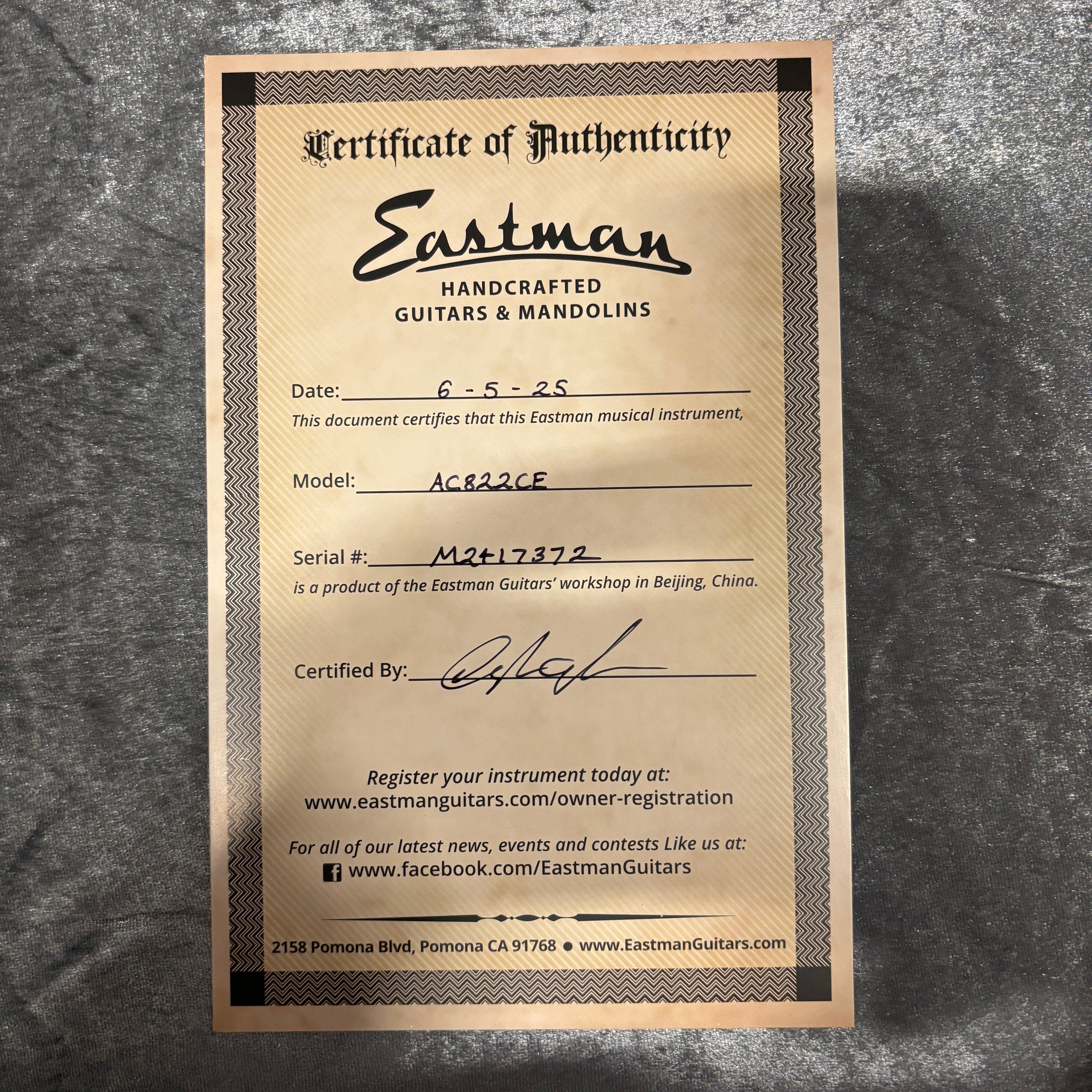 Eastman AC822CE natural acoustic guitar certificate of authenticity with serial number documentation