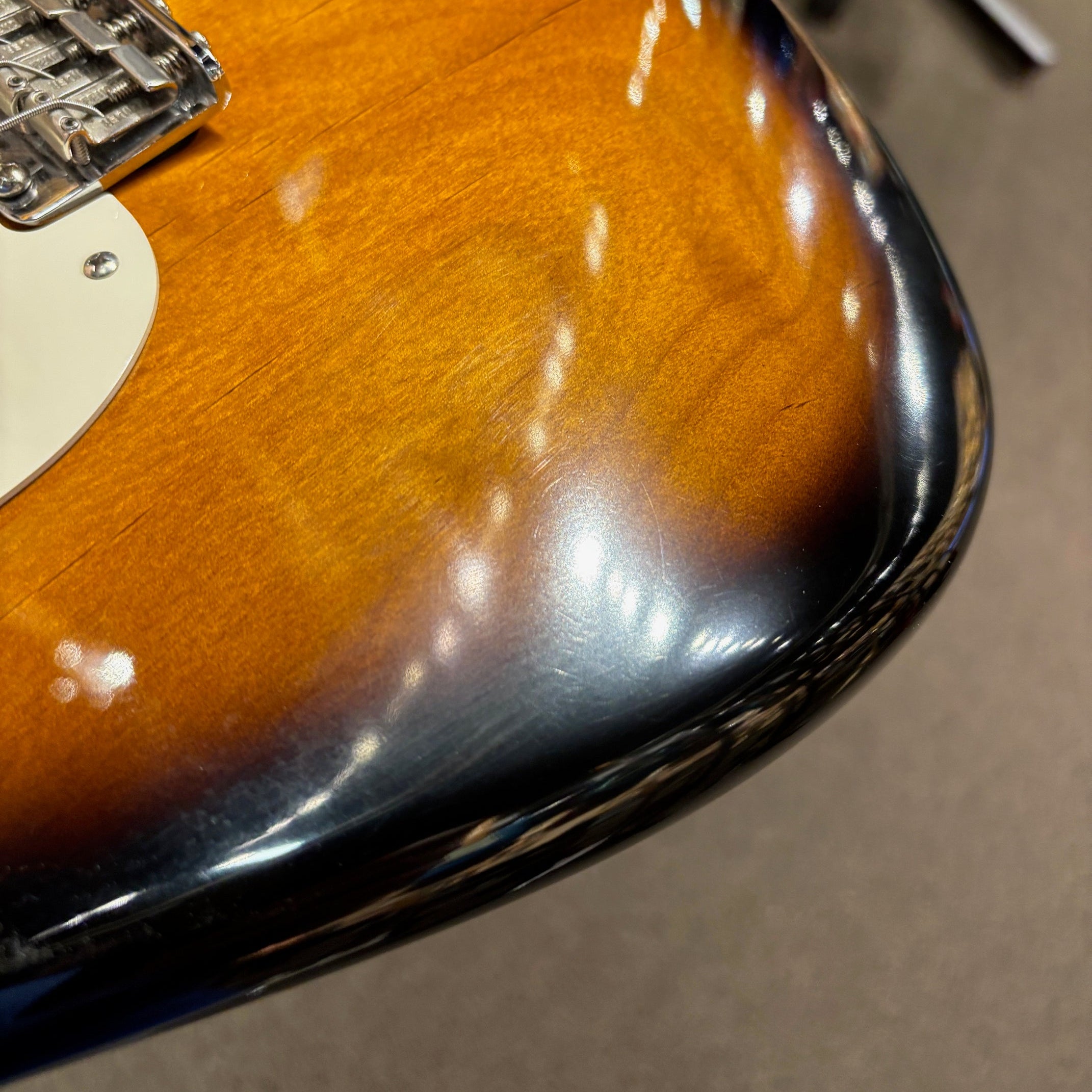 Pre-owned Fender Eric Johnson Stratocaster electric guitar 2-Color Sunburst with chrome bridge hardware