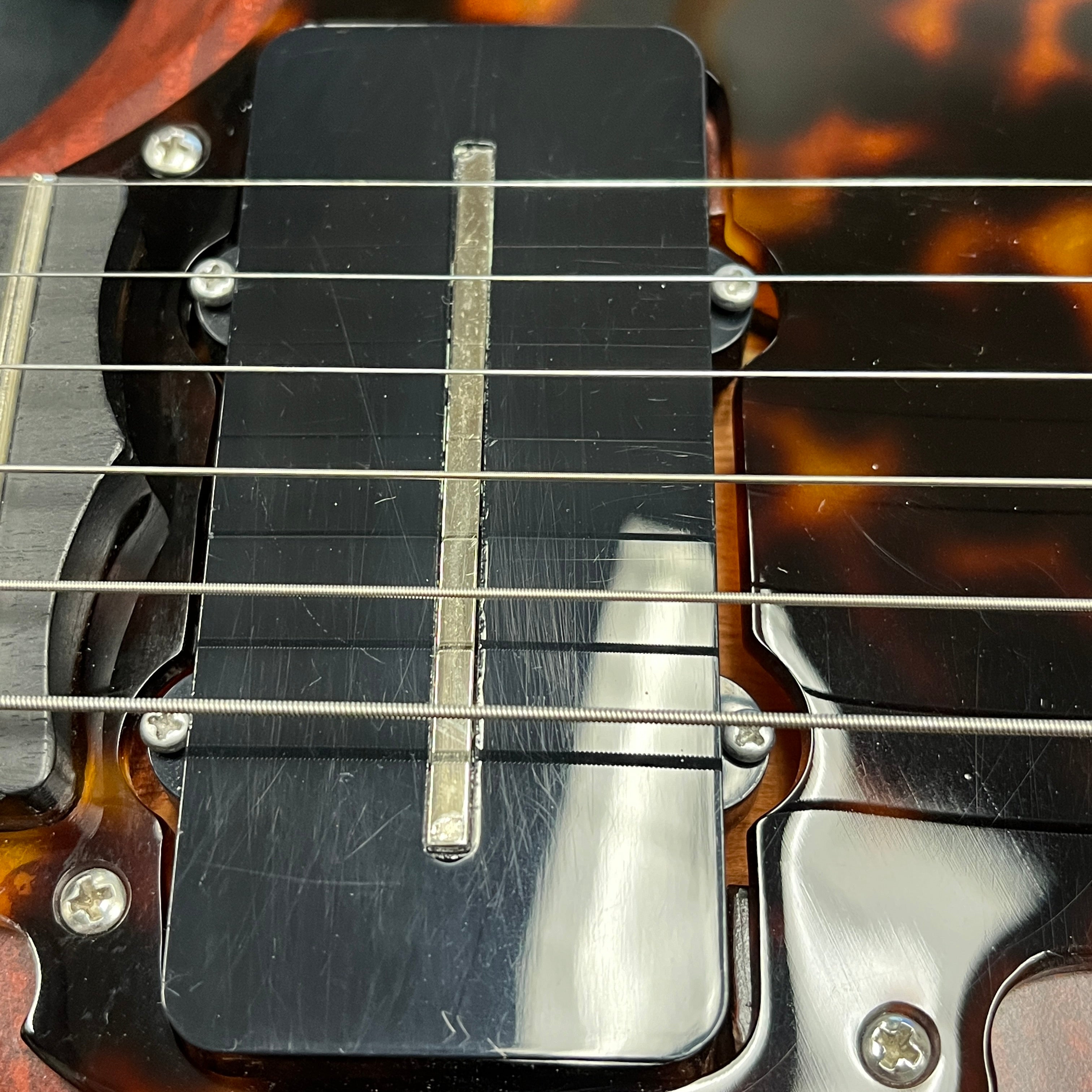 Scott Walker Phoenix mahogany electric guitar with maple neck and dual humbuckers