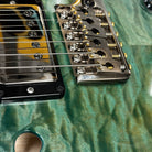 Pre-owned Paul Reed Smith Special semi-hollow electric guitar Makena Blue with dual humbuckers and gold hardware