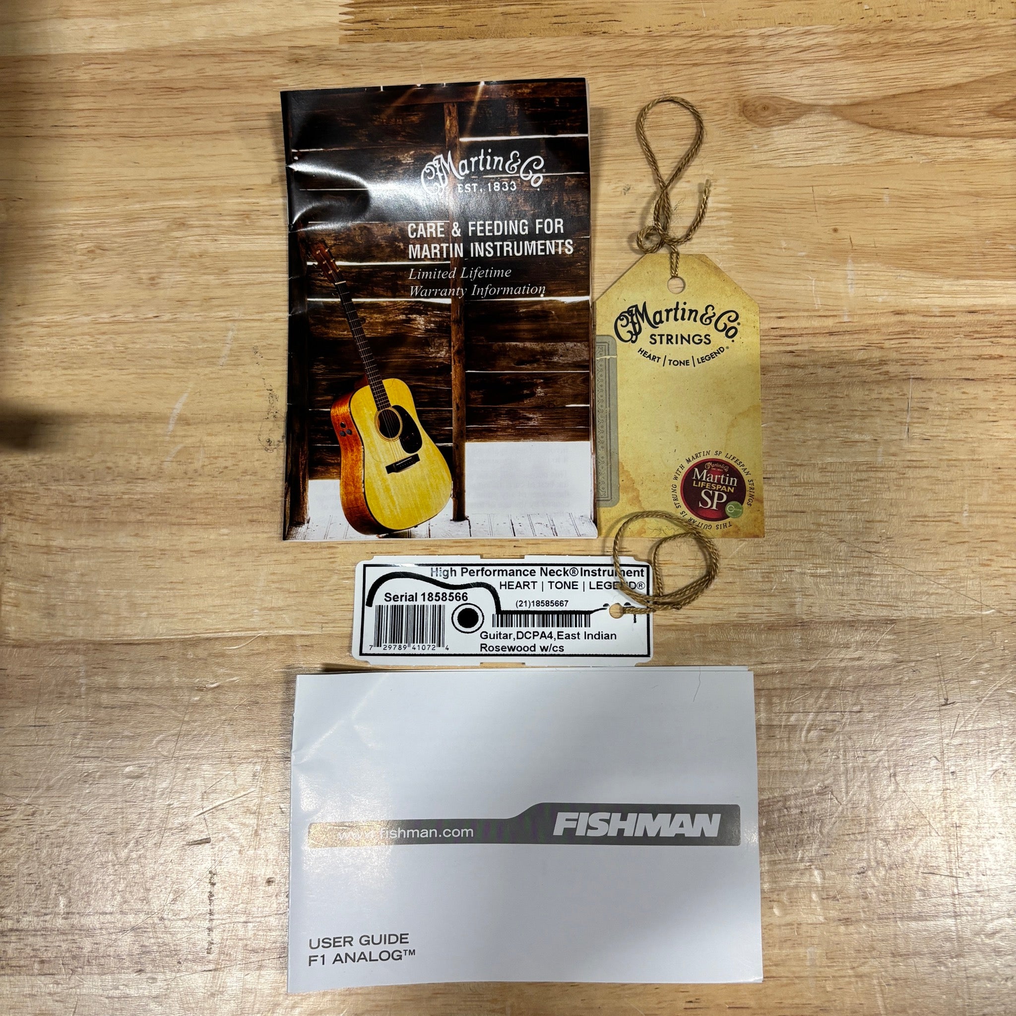 Martin DCPA4-R Natural acoustic-electric guitar documentation set with care guide, warranty tag, and Fishman F1 Analog user g