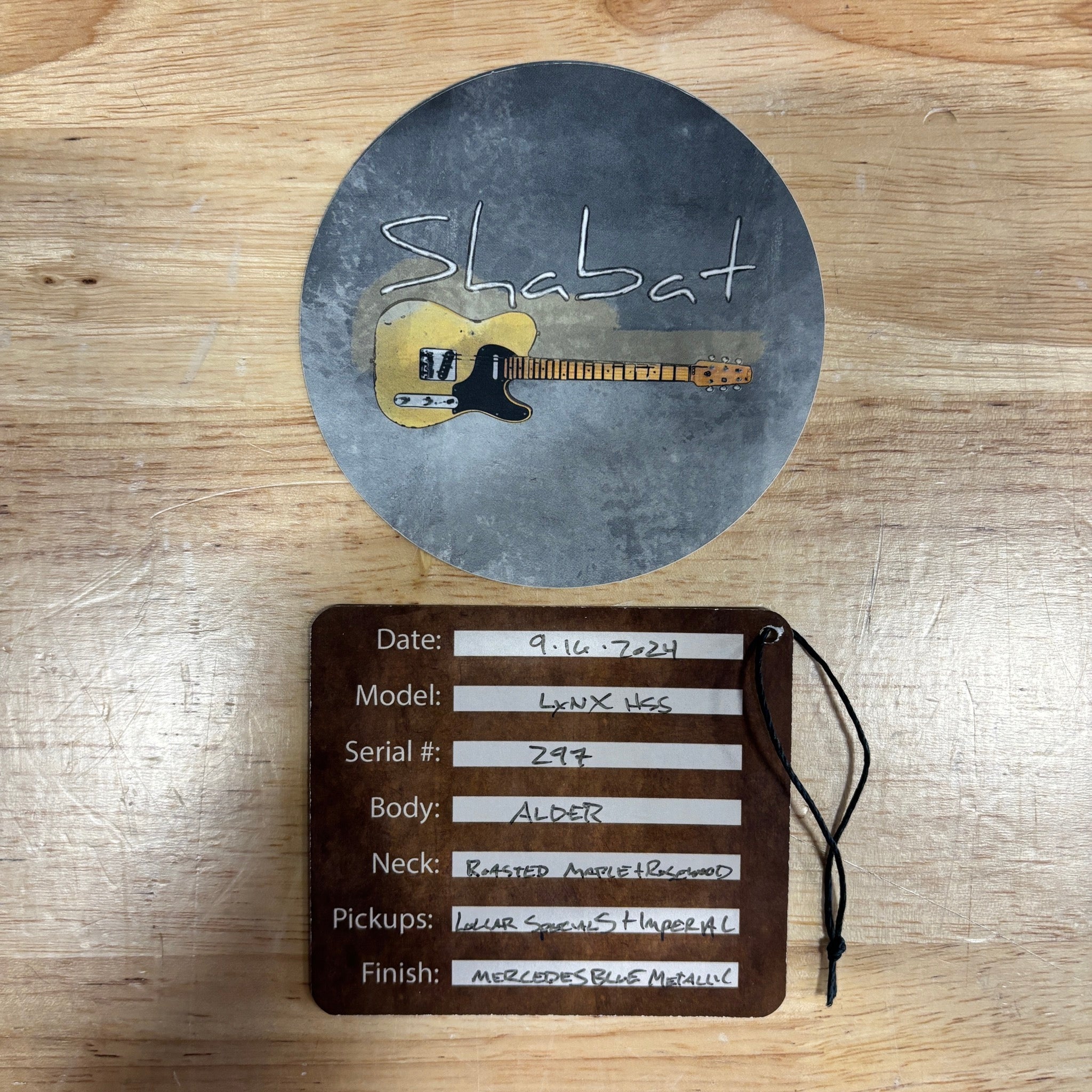 Shabat Custom Lynx HSS electric guitar spec tag and sticker Mercedes Blue Metallic alder body roasted maple neck Lollar picku