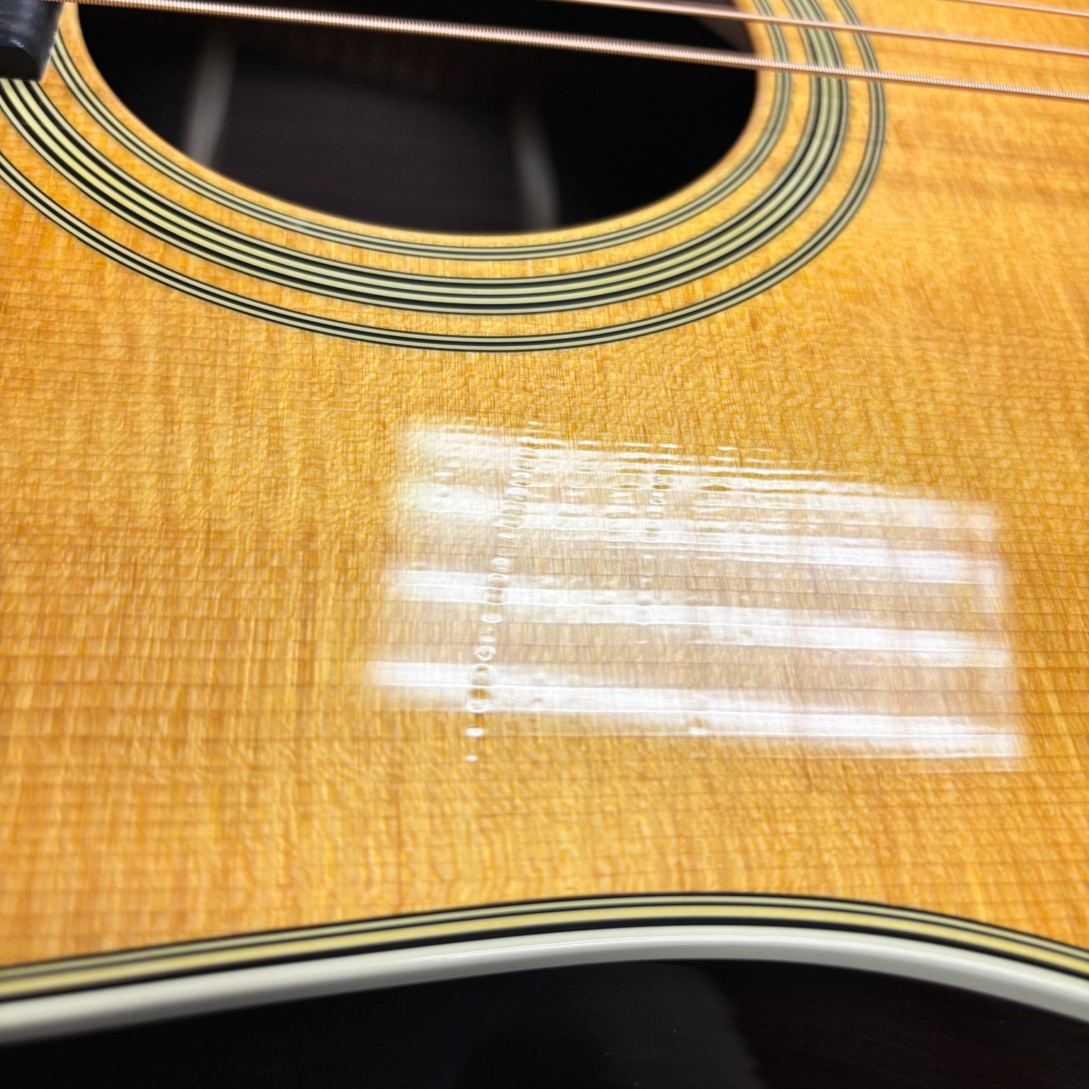 Martin D-28 dreadnought acoustic guitar Aging Toner natural finish with spruce top and herringbone rosette binding
