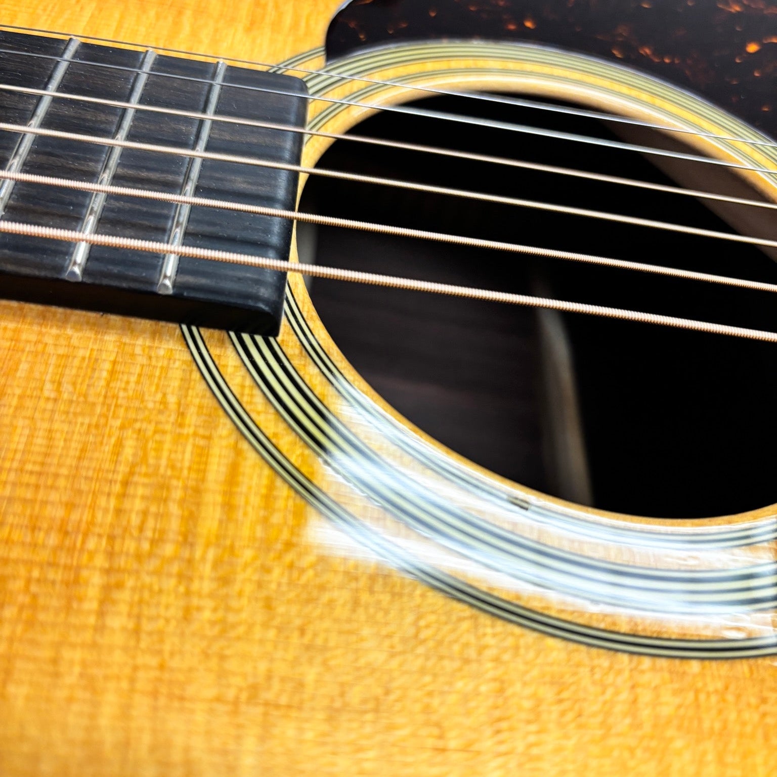 Martin D-28 Aging Toner dreadnought acoustic guitar natural finish with herringbone rosette and flamed spruce top