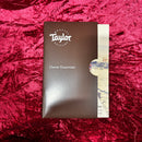 Taylor 414ce Next Generation Natural guitar Owner Essentials packet with brown booklet and registration guide