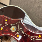 Gibson SJ-200 Standard Sunburst jumbo acoustic guitar with ornate floral pickguard inlay and multi-ply body binding