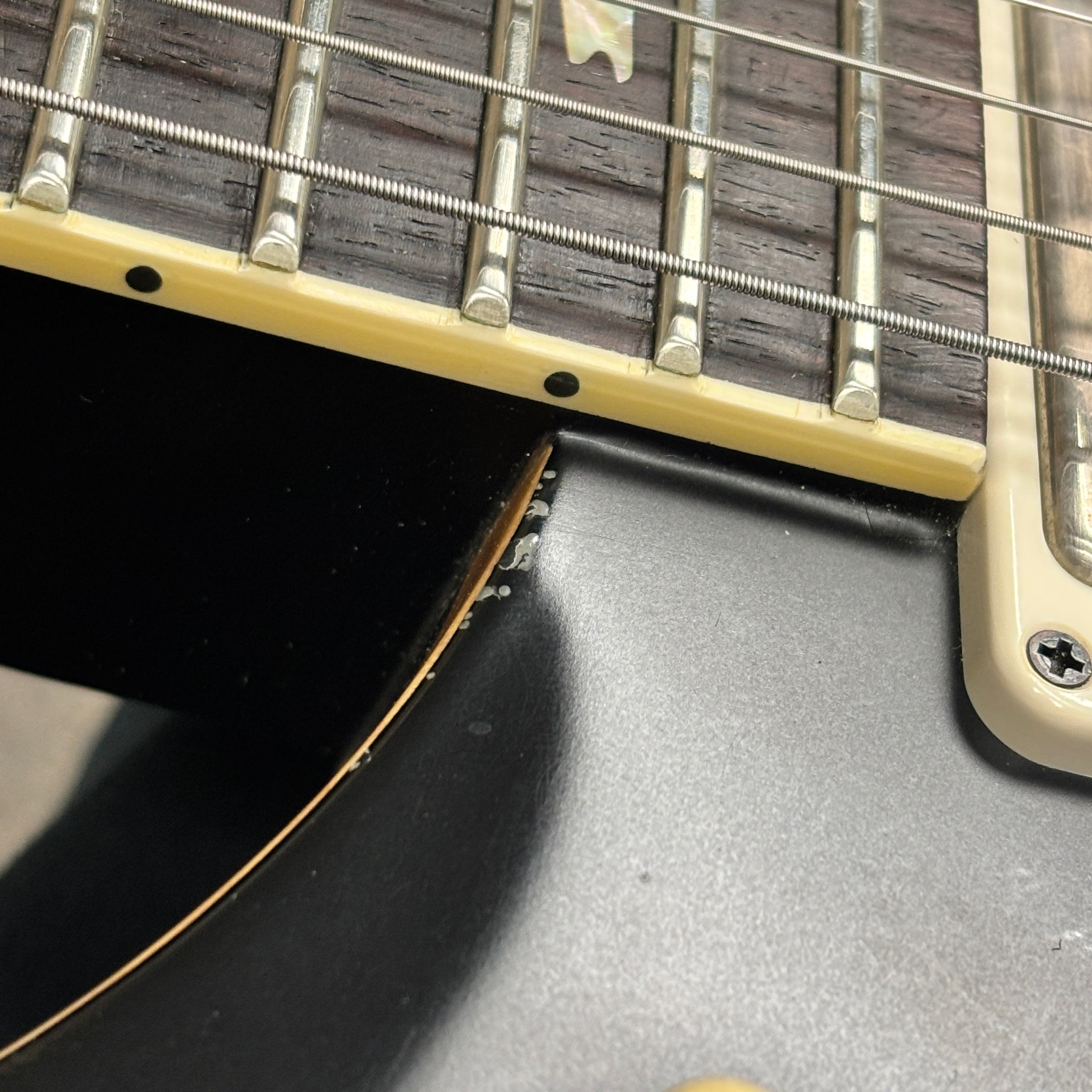 Paul Reed Smith McCarty 594 electric guitar Satin Black with rosewood fretboard and cream binding detail at neck joint