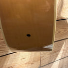 Epiphone FT-570BL acoustic guitar Natural finish showing gloss body back with strap button detail