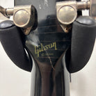 Gibson Inspired By Joe Bonamassa Aged Les Paul Goldtop electric guitar headstock with nickel tuners on guitar stand
