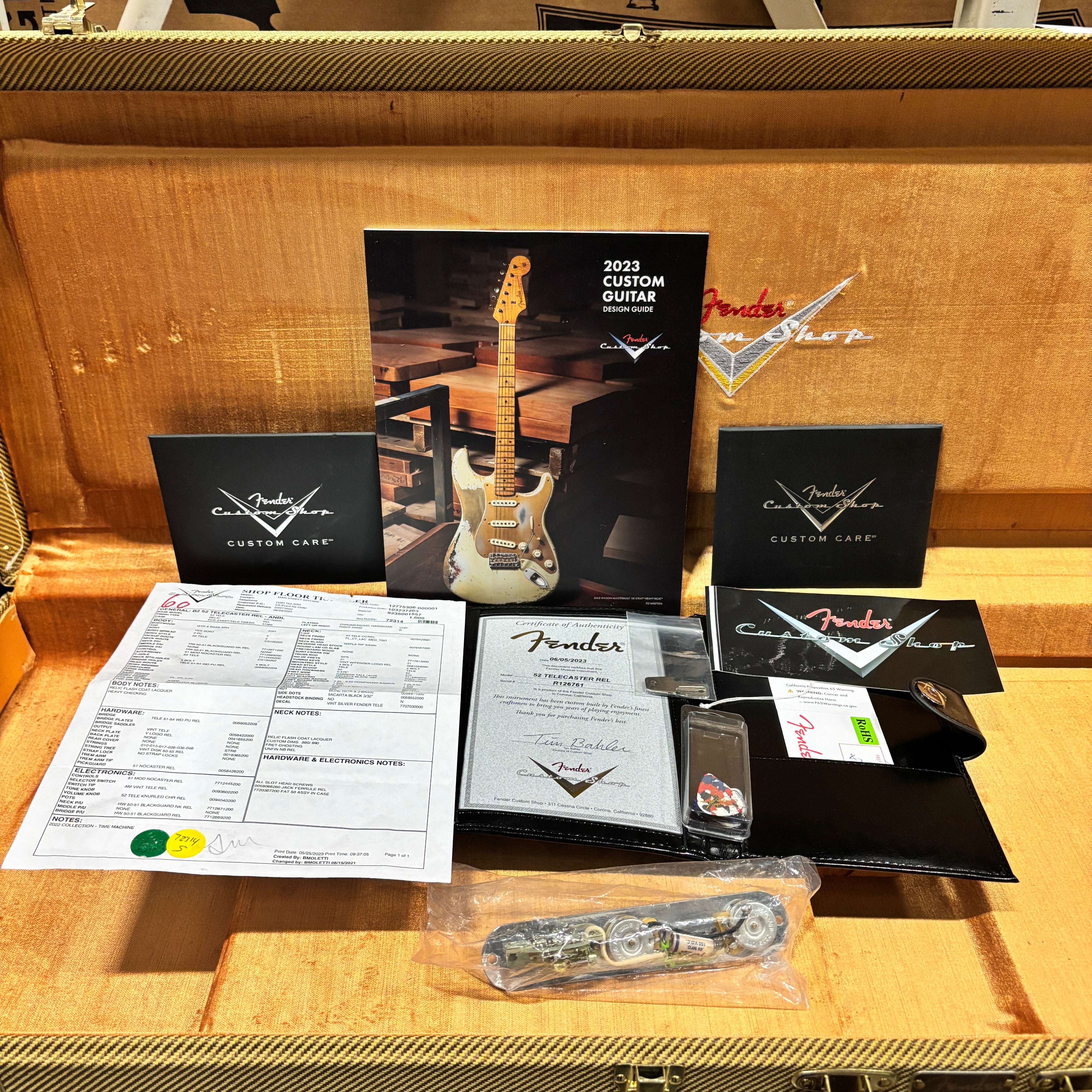 Fender Custom Shop 52 Telecaster Relic case candy with certificate of authenticity, shop order, and Custom Care booklets