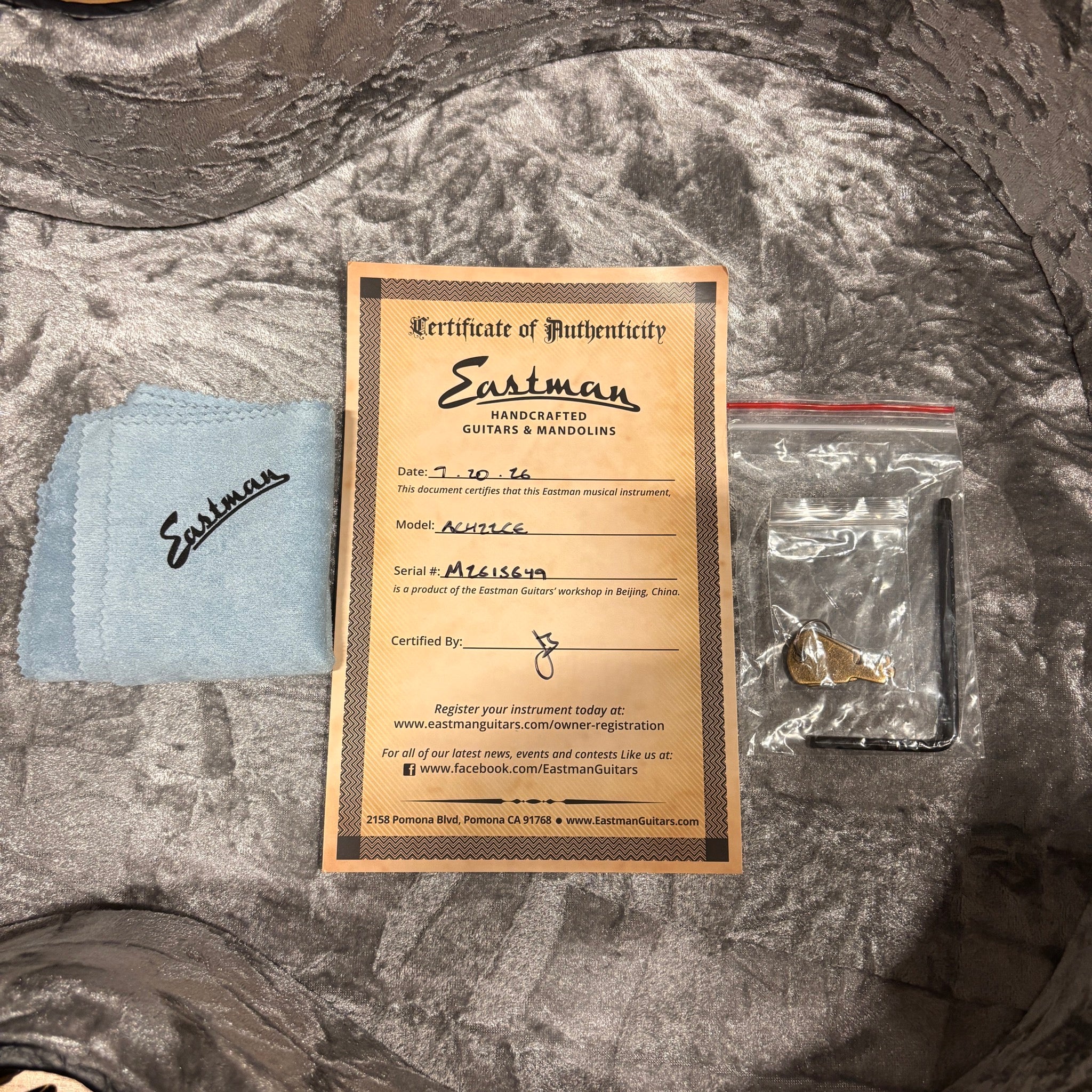 Eastman AC422CE Natural guitar certificate of authenticity with polishing cloth and truss rod wrench accessories