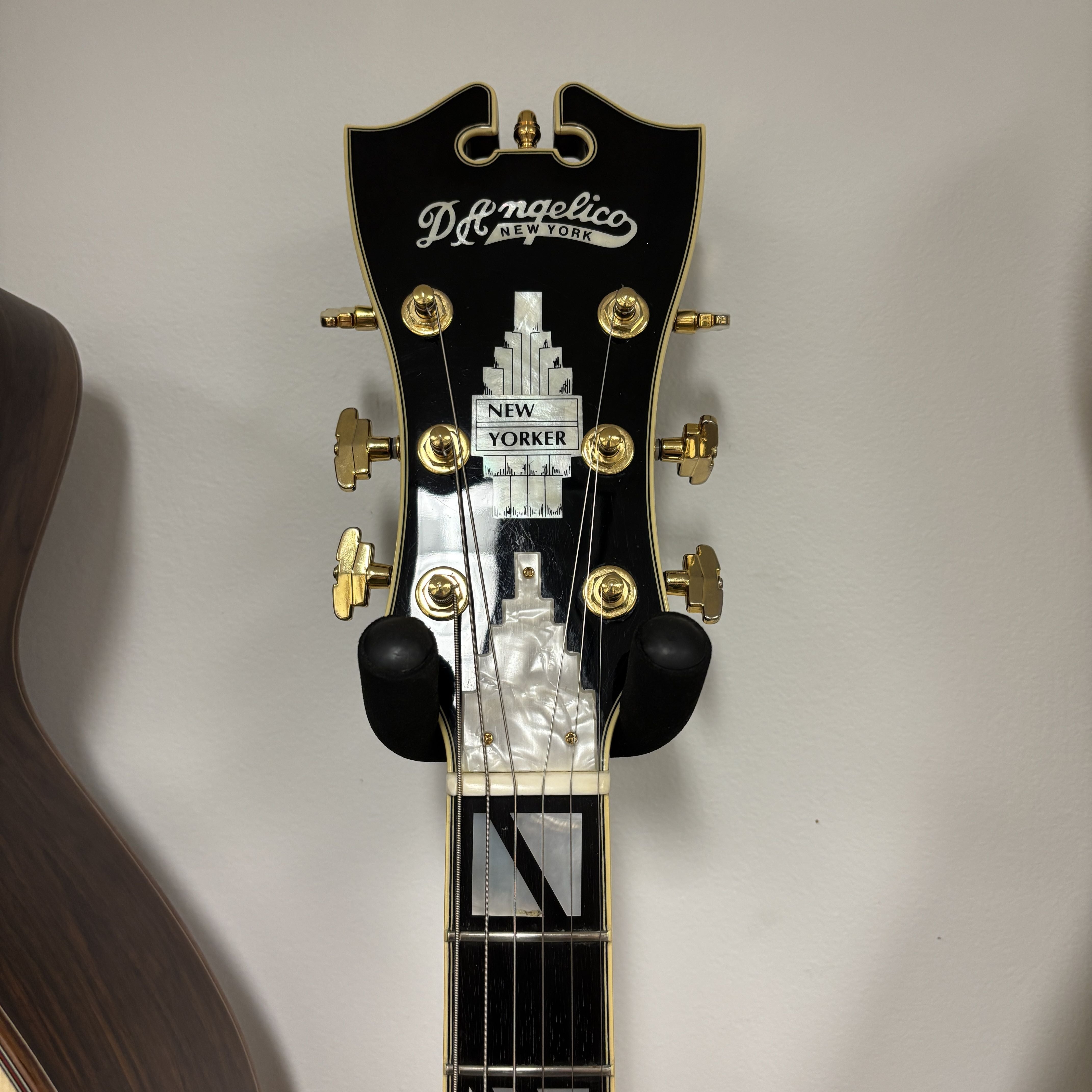 Pre-owned D'Angelico New Yorker semi-hollow electric guitar sunburst with gold hardware