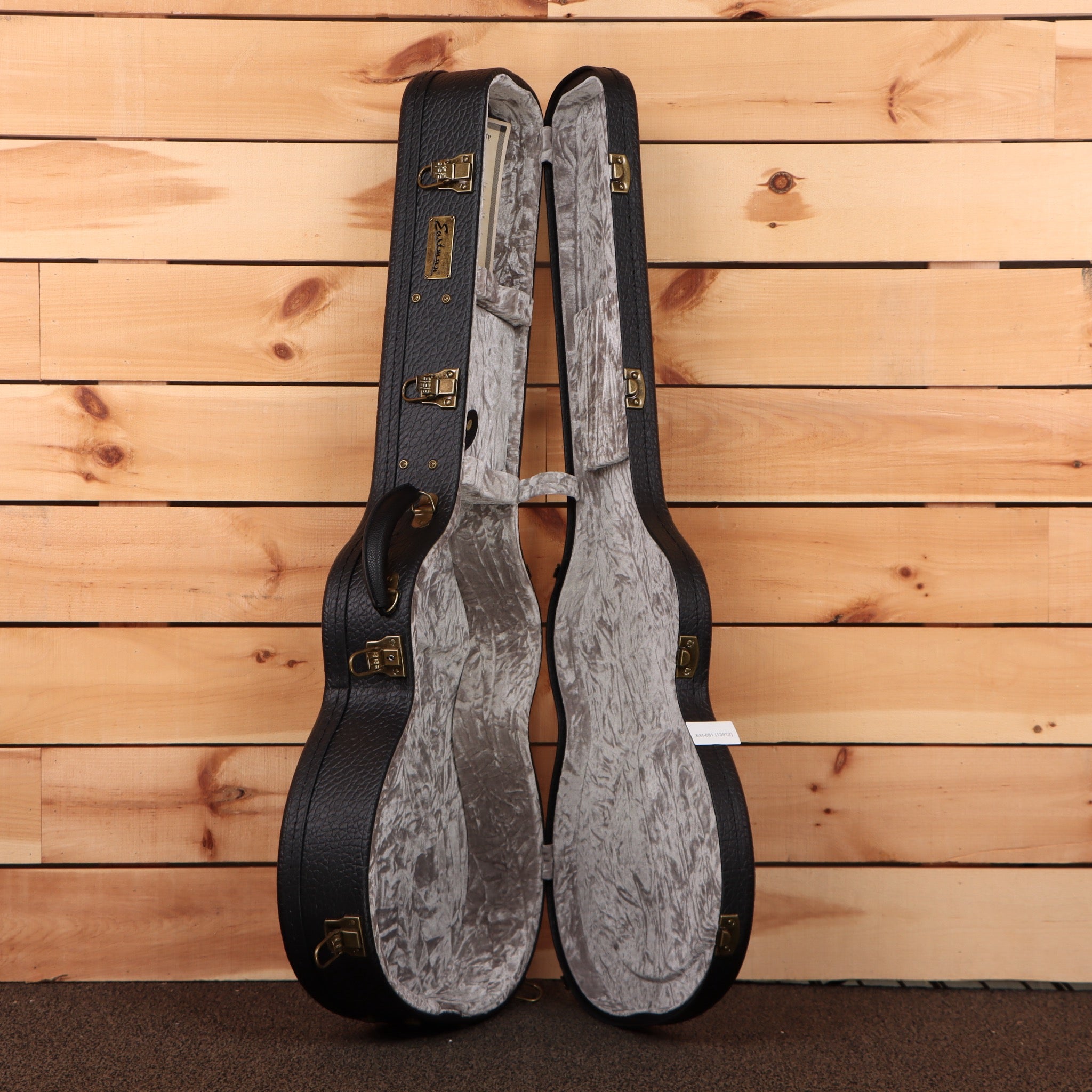 Eastman E10OMTC acoustic guitar natural finish with gray velvet-lined hardshell case