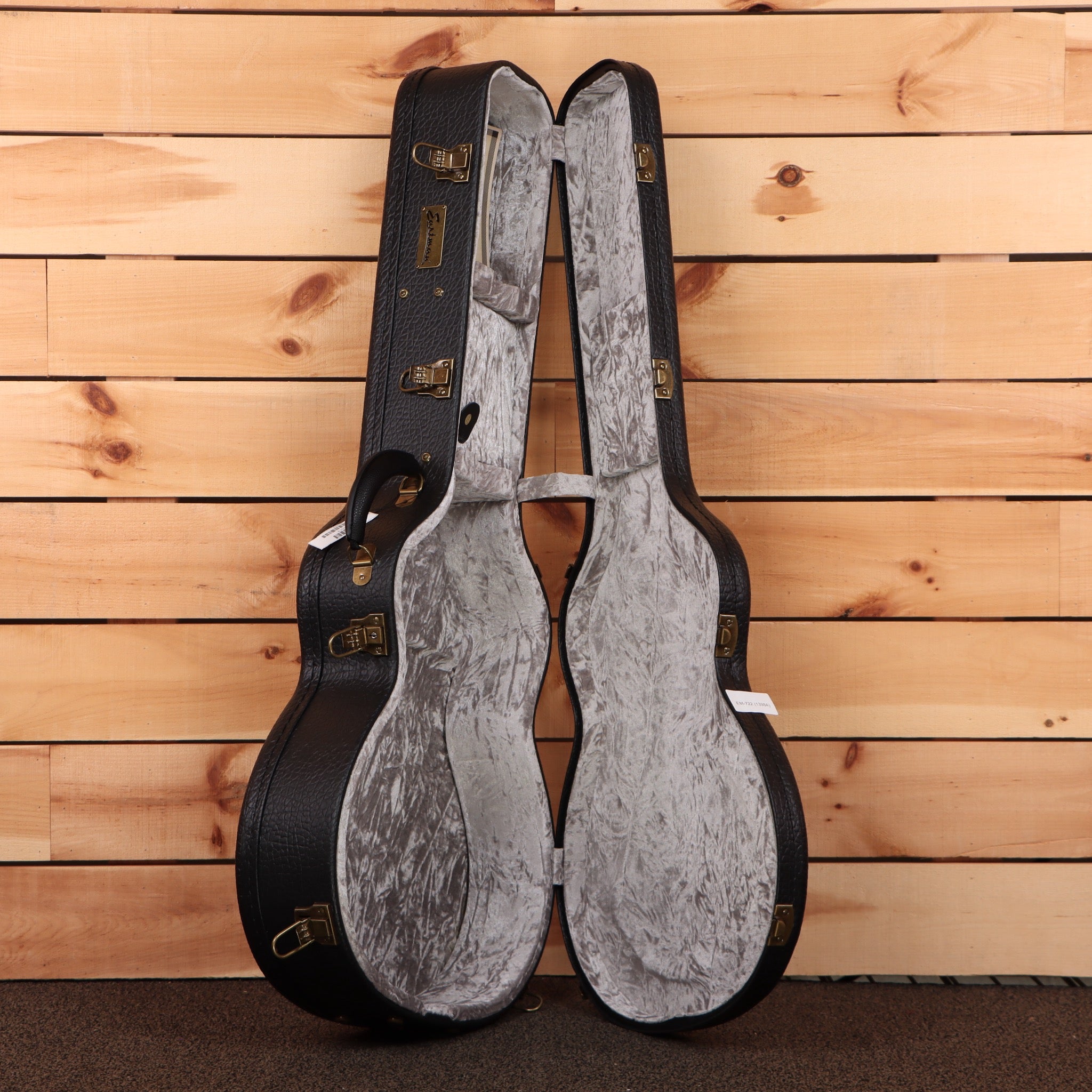 Eastman AC822CE natural acoustic guitar case with gray velvet interior and brass hardware