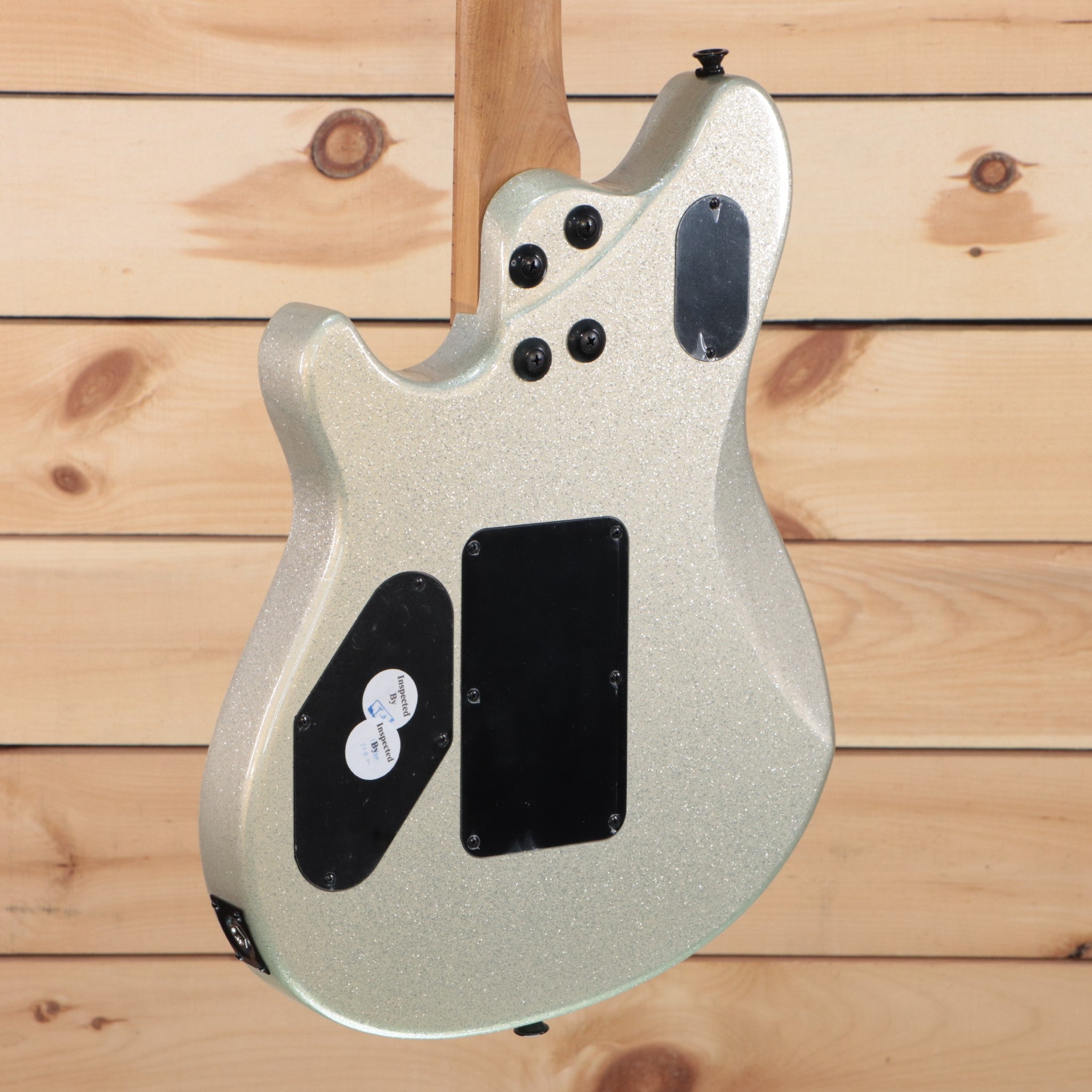 EVH Wolfgang WG Standard Silver Sparkle electric guitar with humbucker pickups and contoured body