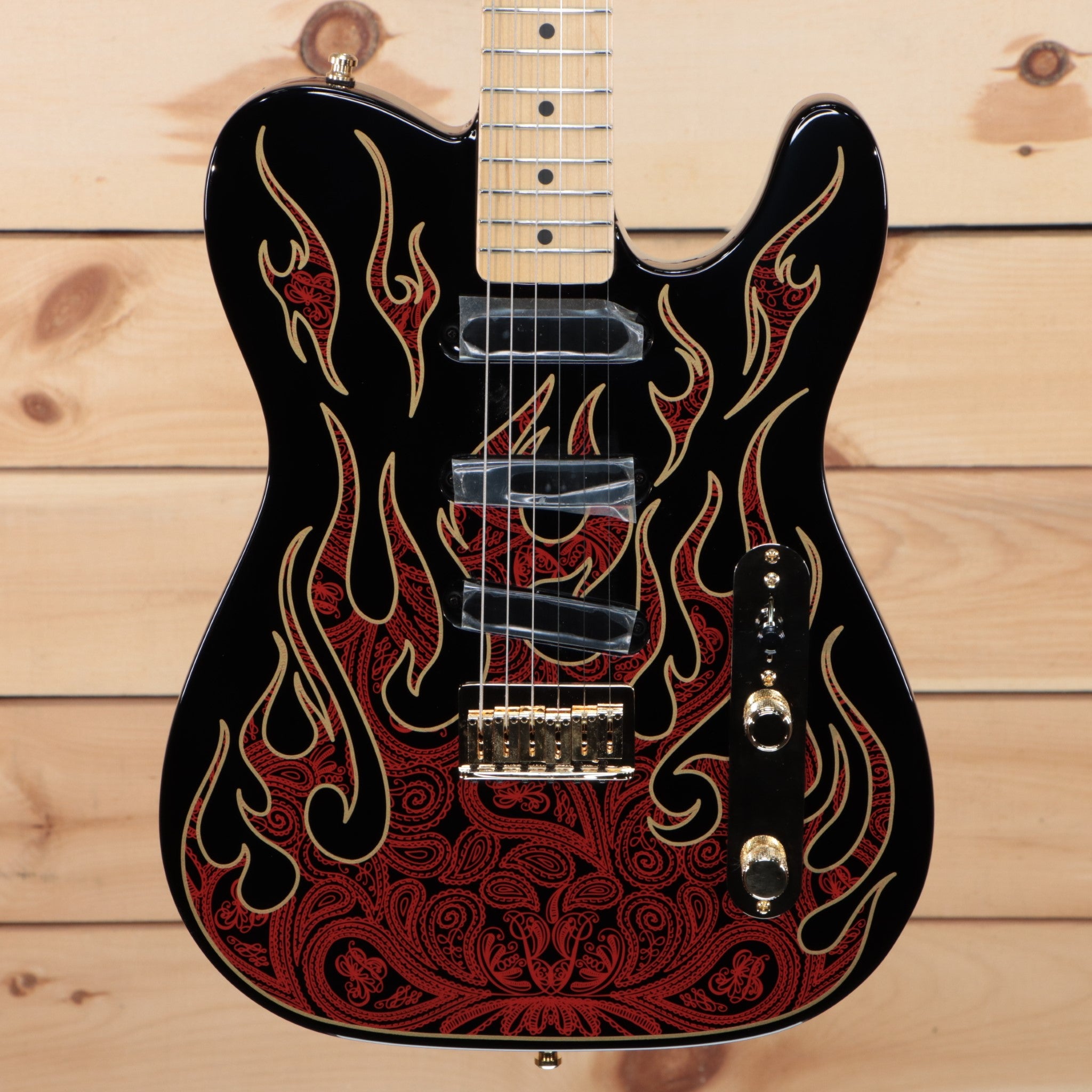 Fender James Burton Telecaster electric guitar red paisley flames with ornate inlay design and single-coil pickups