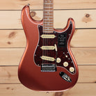 Fender Player Plus Stratocaster electric guitar Aged Candy Apple Red with single-coil pickups