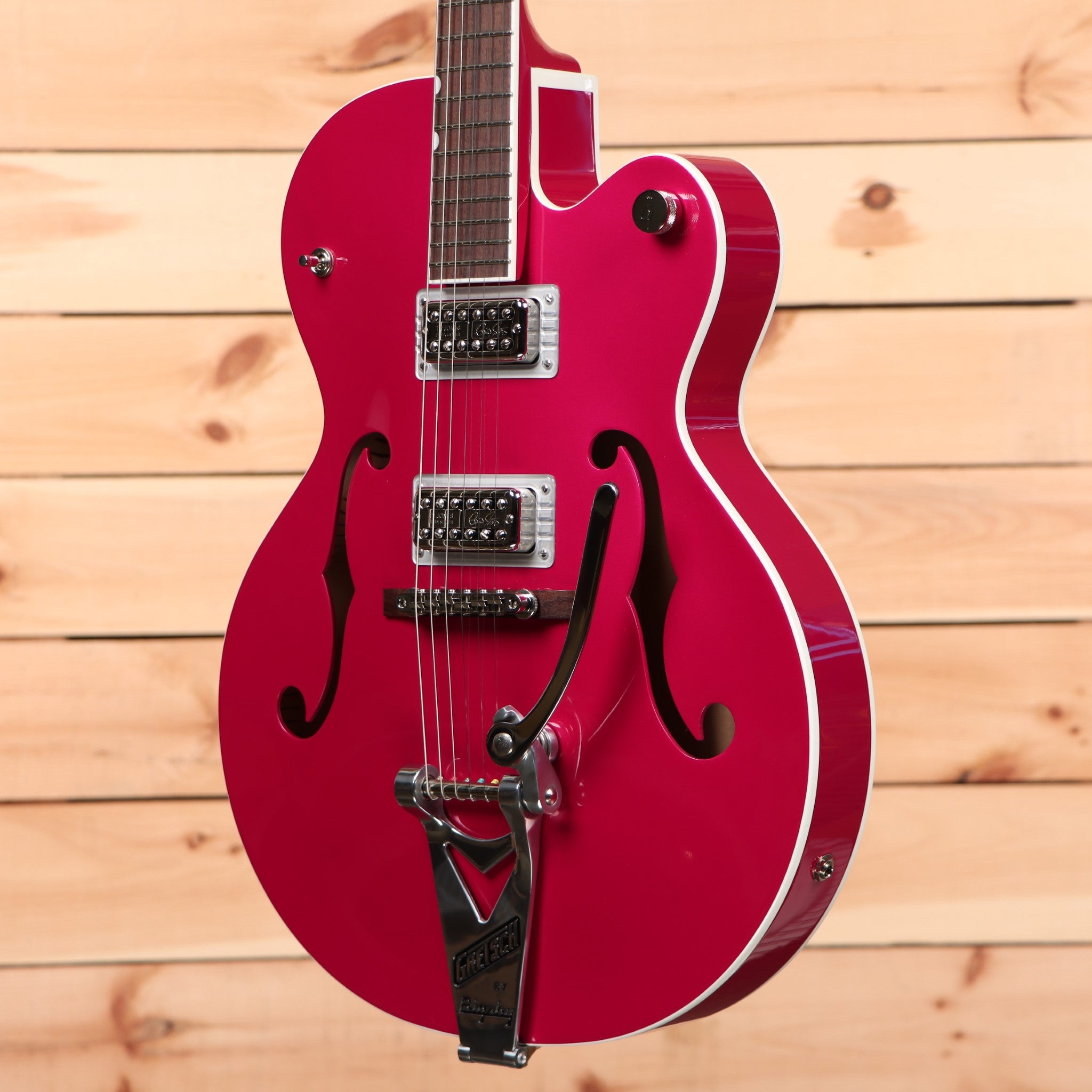Gretsch G6120THR Brian Setzer Signature Hot Rod semi-hollowbody electric guitar Candy Magenta with f-holes and dual humbuckers