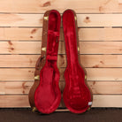Gibson Les Paul Deluxe 70s electric guitar 70s Cherry Sunburst with open hard case and red velvet interior