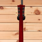 Gibson Les Paul 70s Deluxe wine red electric guitar with dual humbucker pickups and cream binding